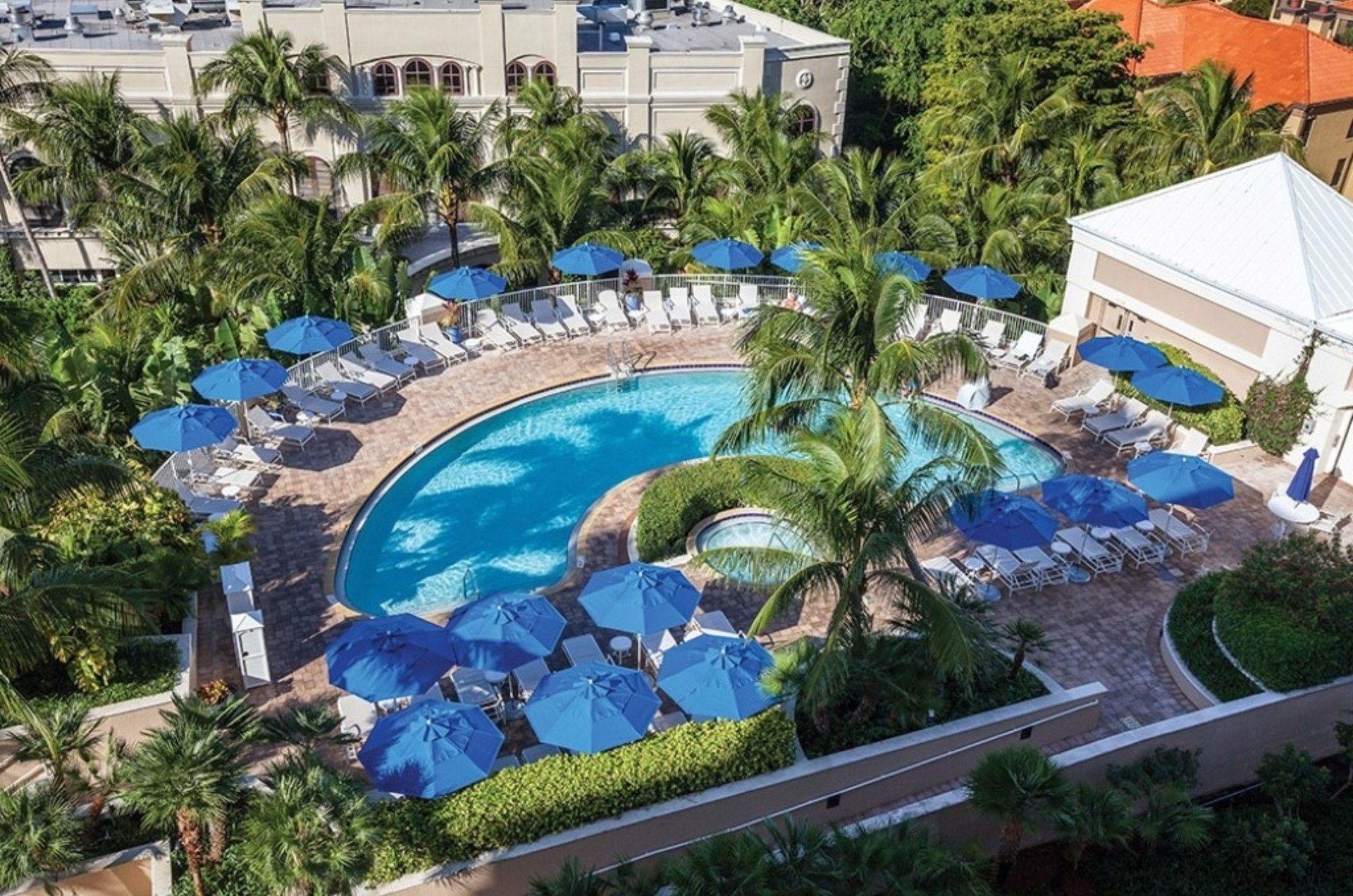 The outdoor swimming pool at Marco Beach Ocean Suites