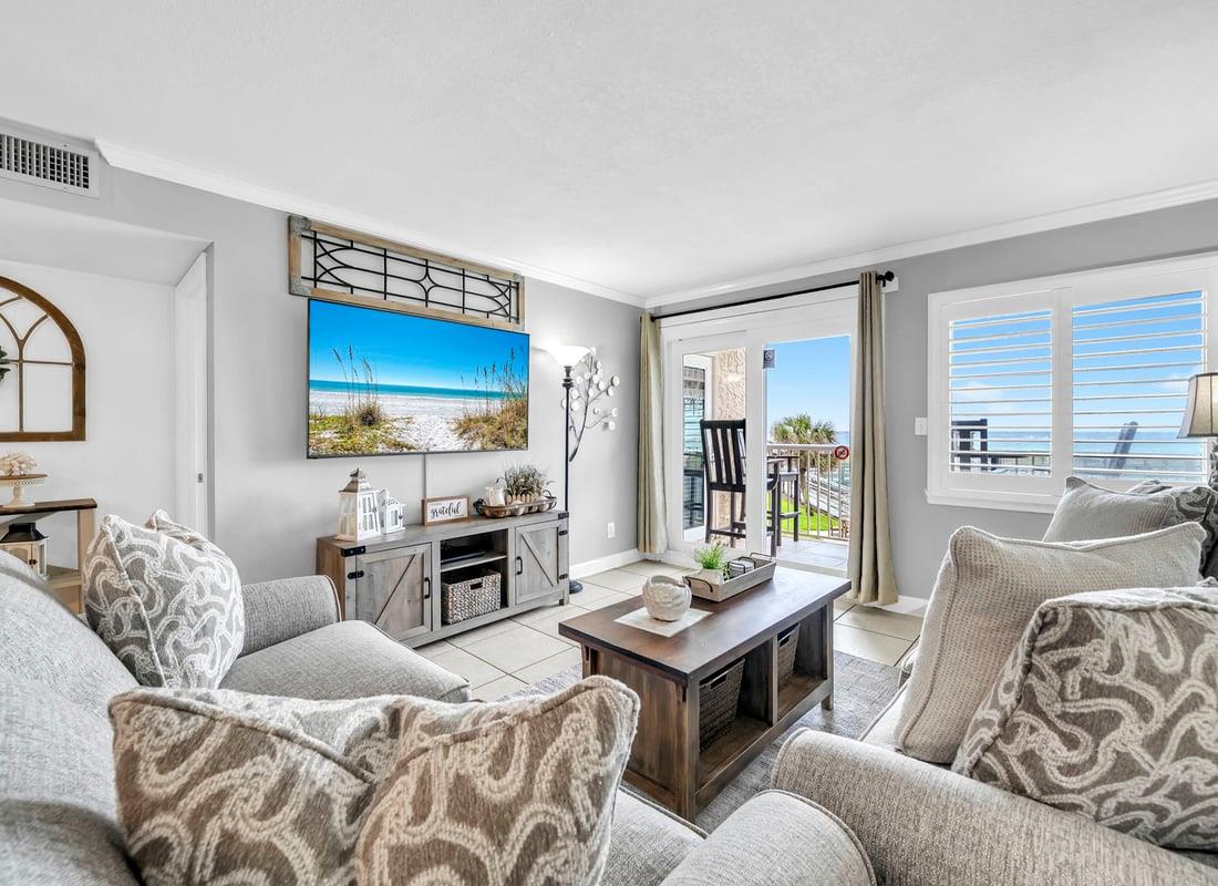 HSRC Living Area with 65 TV  Balcony Access