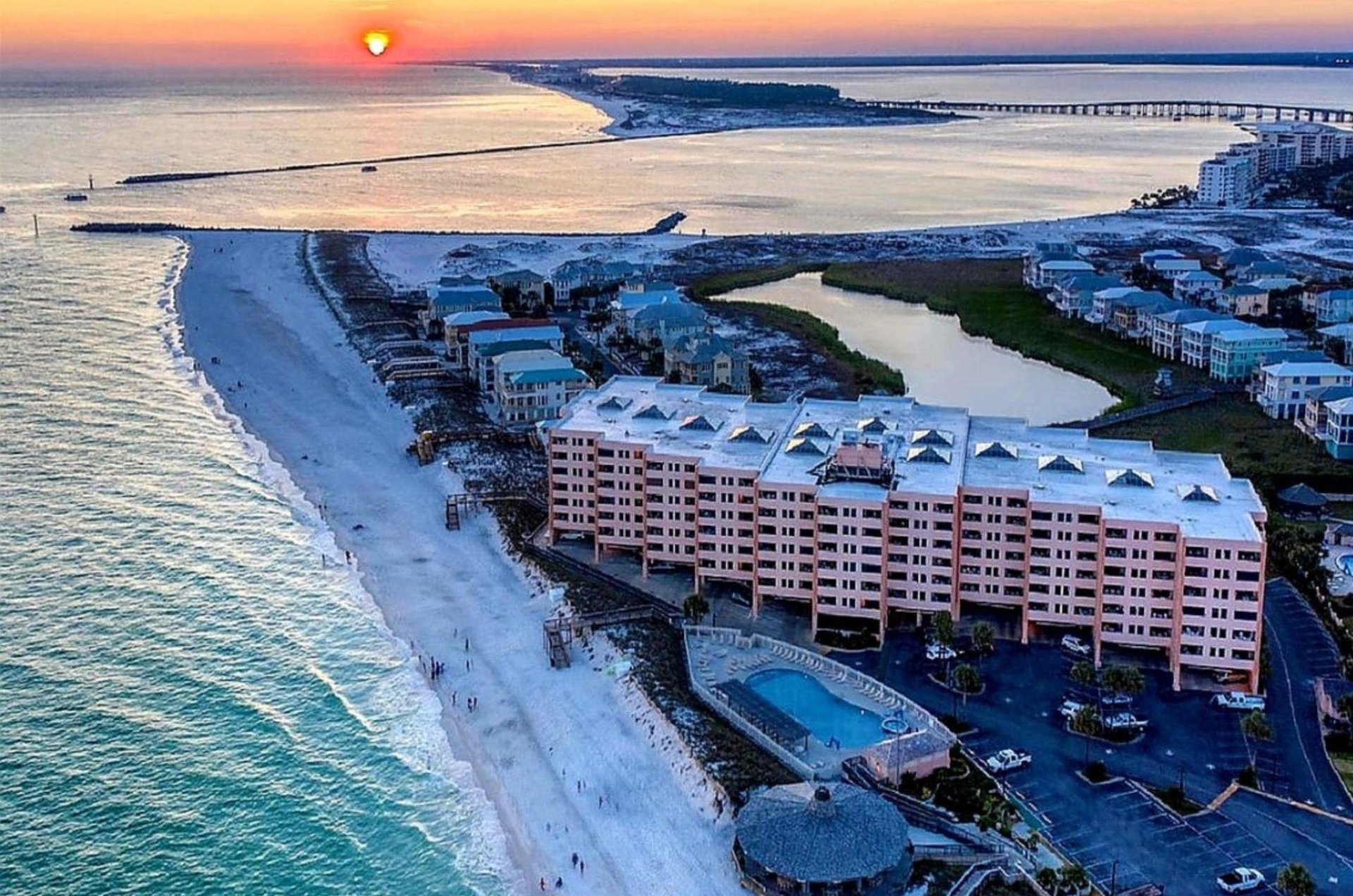 Aerial view of the Gulf, East Pass, and jetties