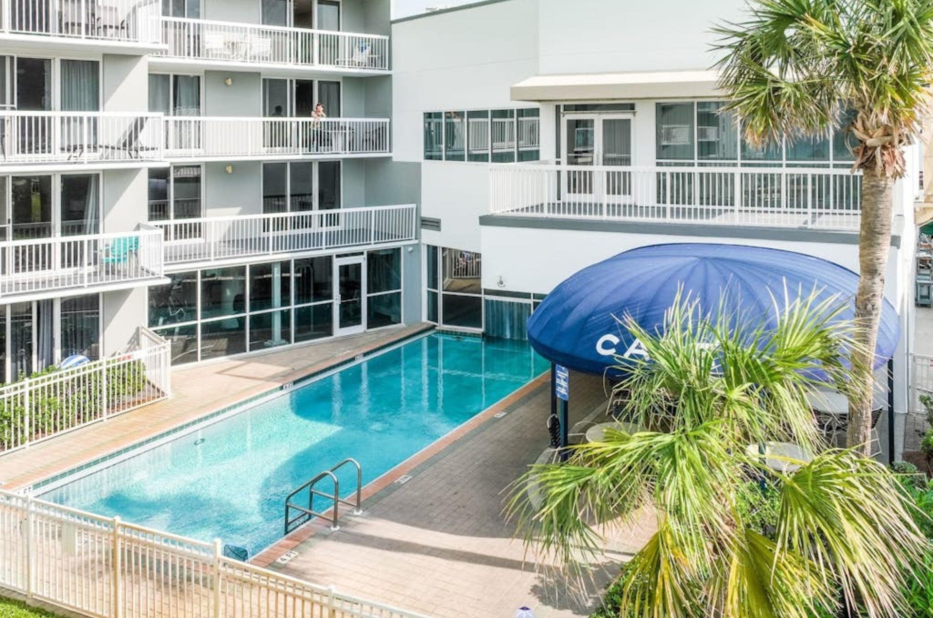The outdoor section of the indooroutdoor pool at Pelican Beach Resort
