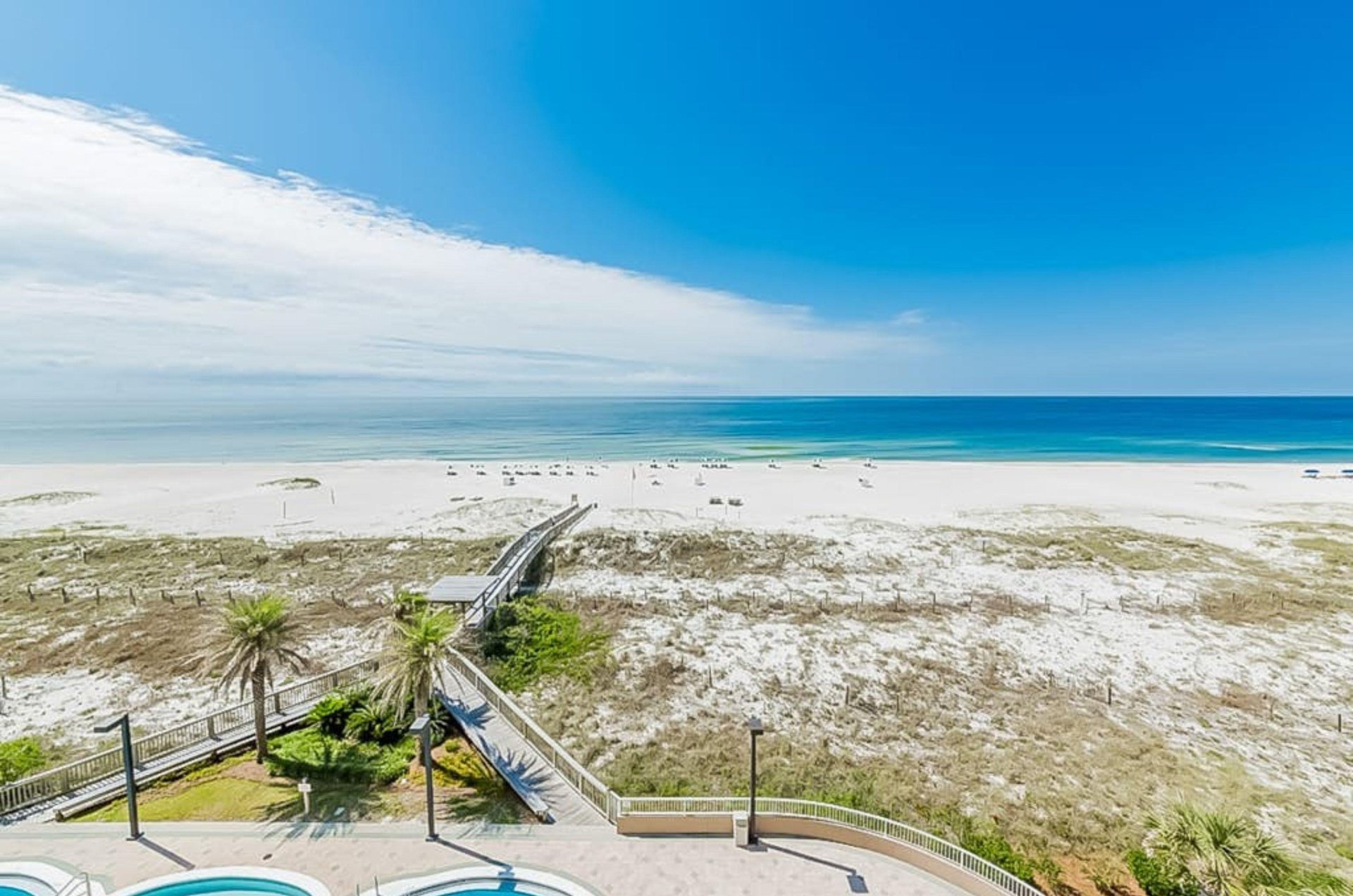 View from a balcony of the beach in front of Spanish Key Condominiums