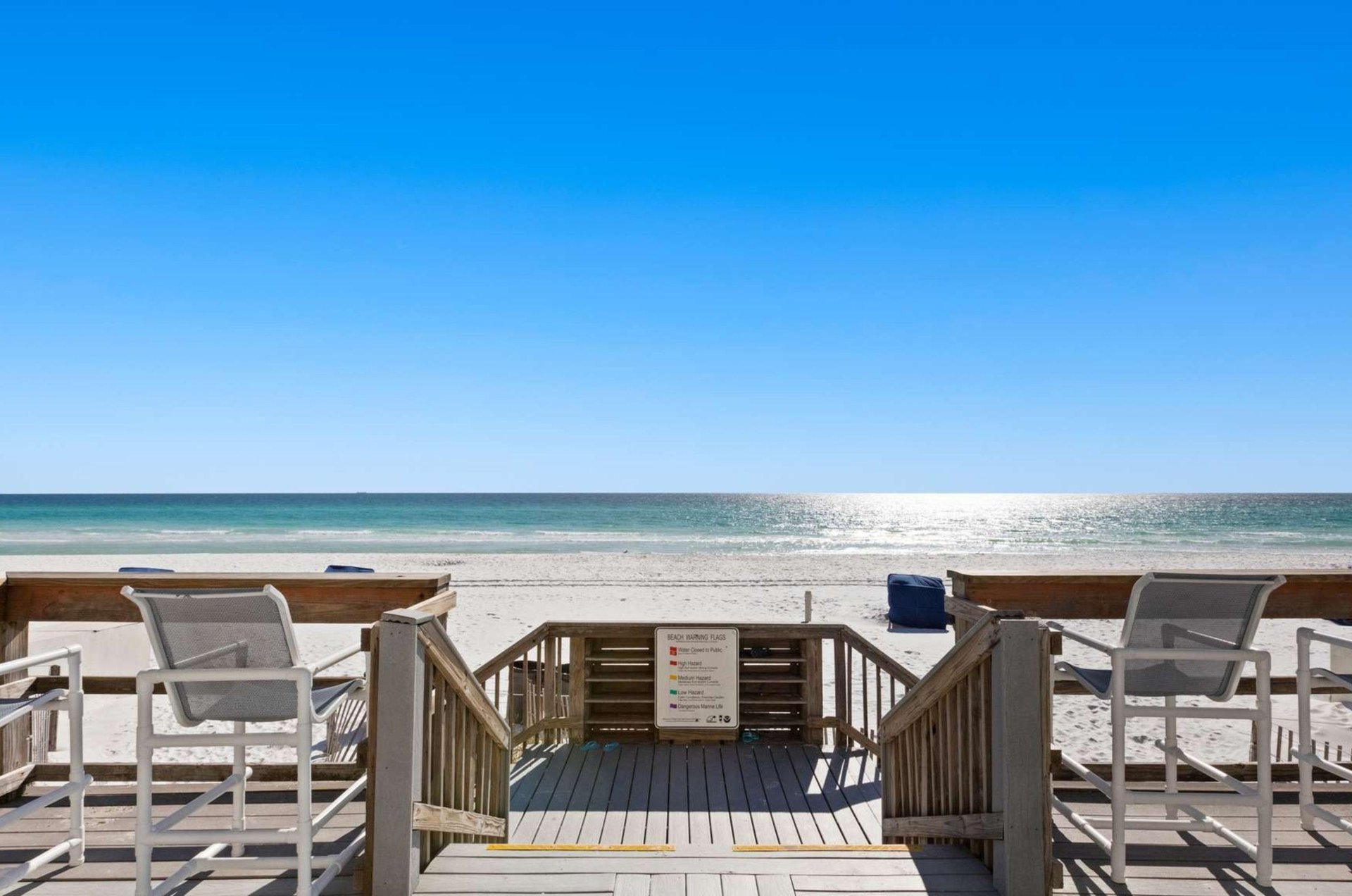 The wooden boardwalk leading to the beach and the Gulf at SunDestin Beach Resort in Destin Florida
