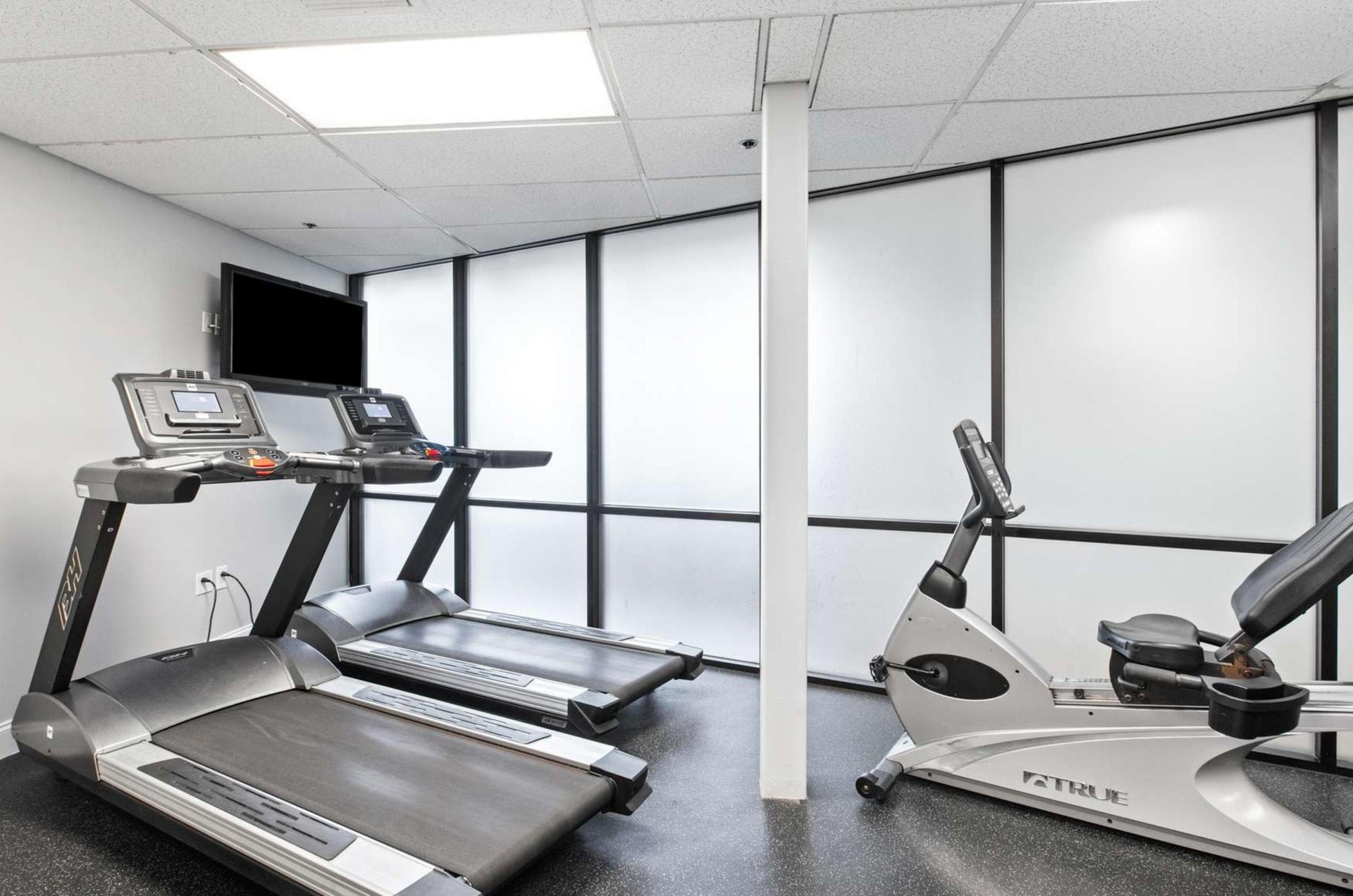 The treadmills and a stationary bike in the gym at SunDestin Beach Resort