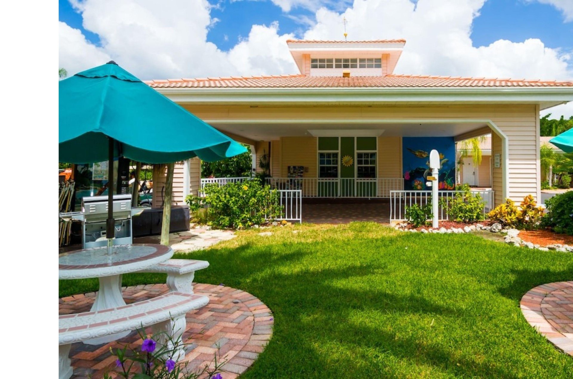 The entrance to Tropical Beach Resorts with an outdoor courtyard