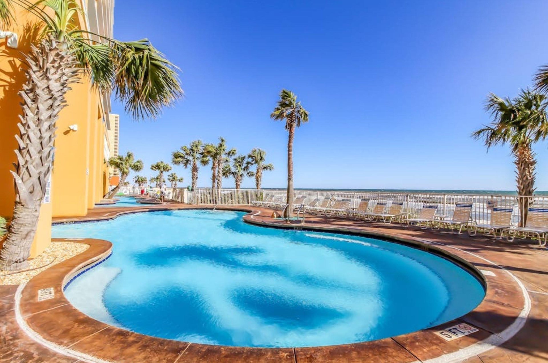 The beachside outdoor pool in front of Splash Resort in Panama City Beach Florida