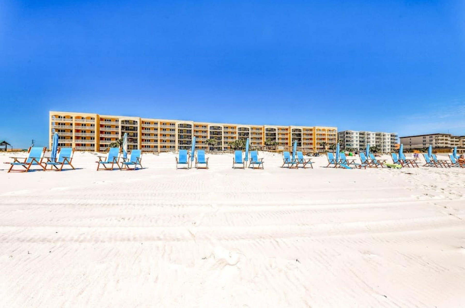 View from the Gulf of Azure and the propertys beach chairs and umbrellas