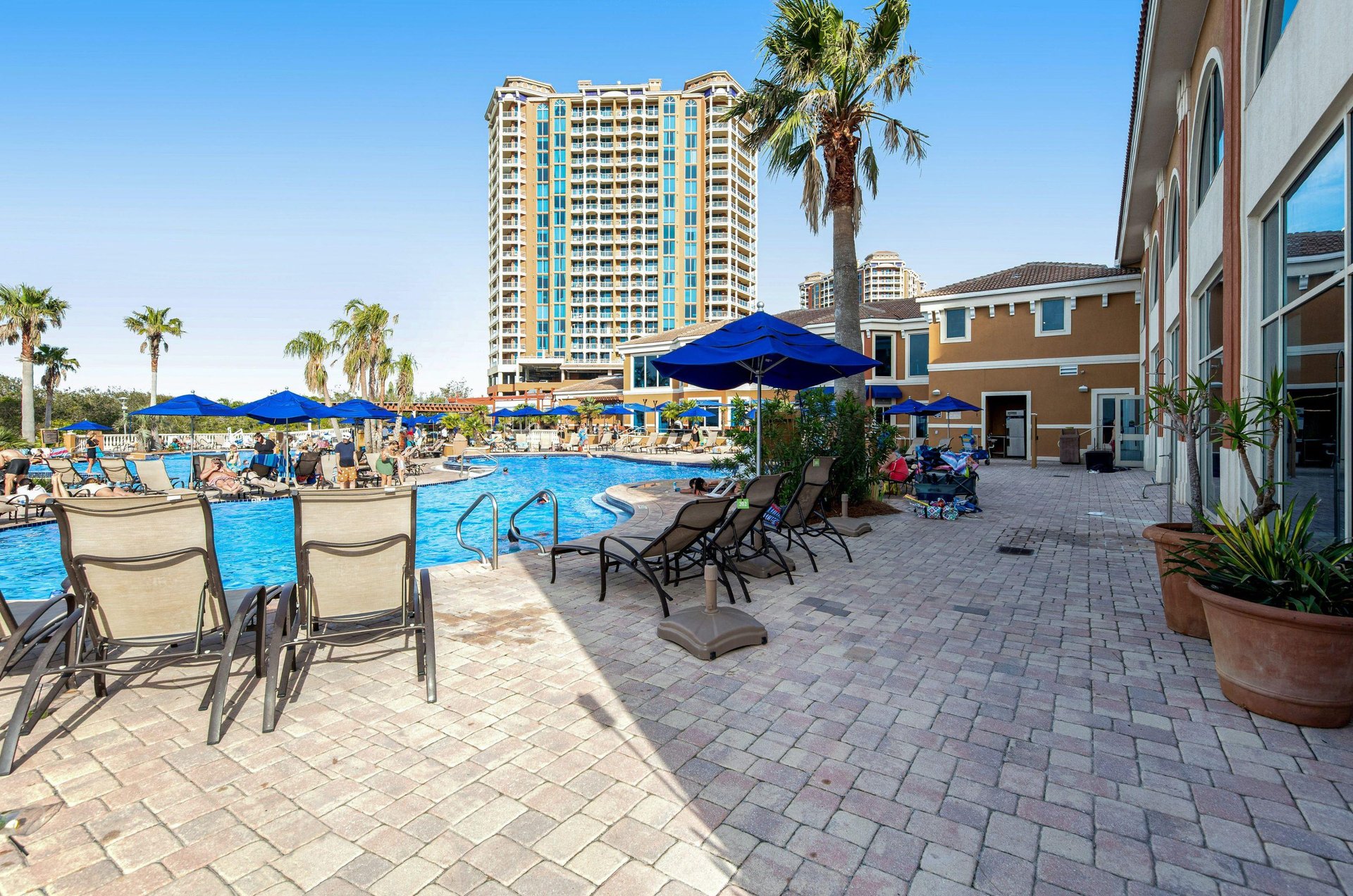 Unwind by the water with poolside lounge chairs