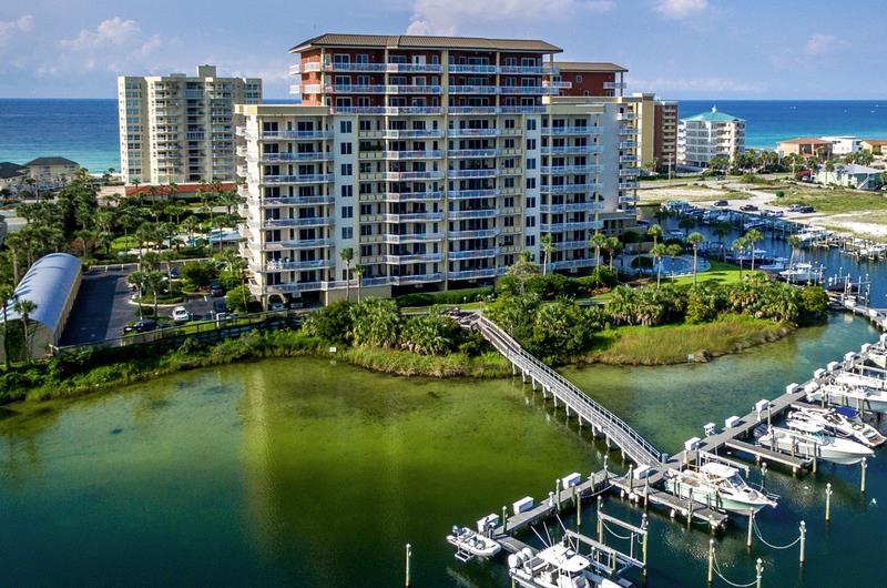 Harbor Landing condominiums sit alongside the Destin Harbor.