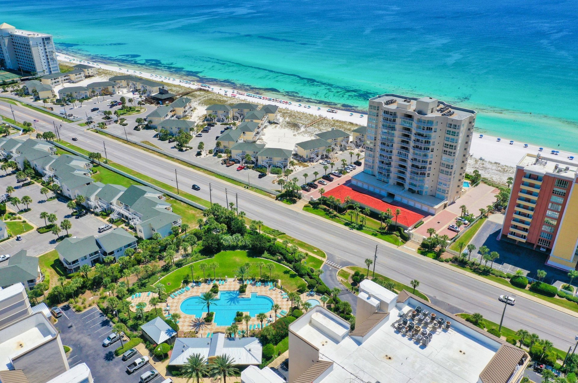 Aerial view of the private owners pool and the private beach access across the street