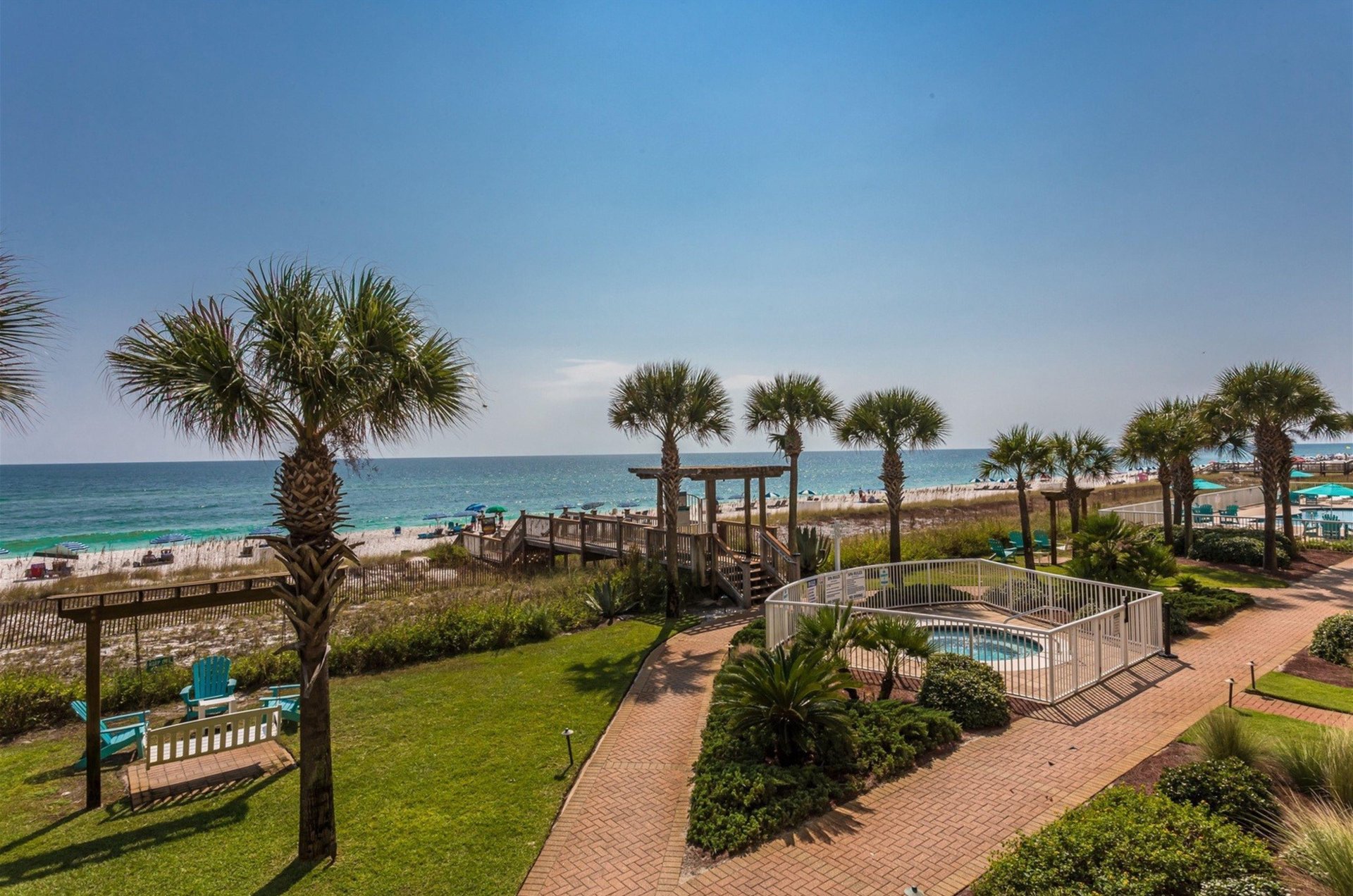 View from a balcony of the lusciousgrounds at Sandy Key Condos