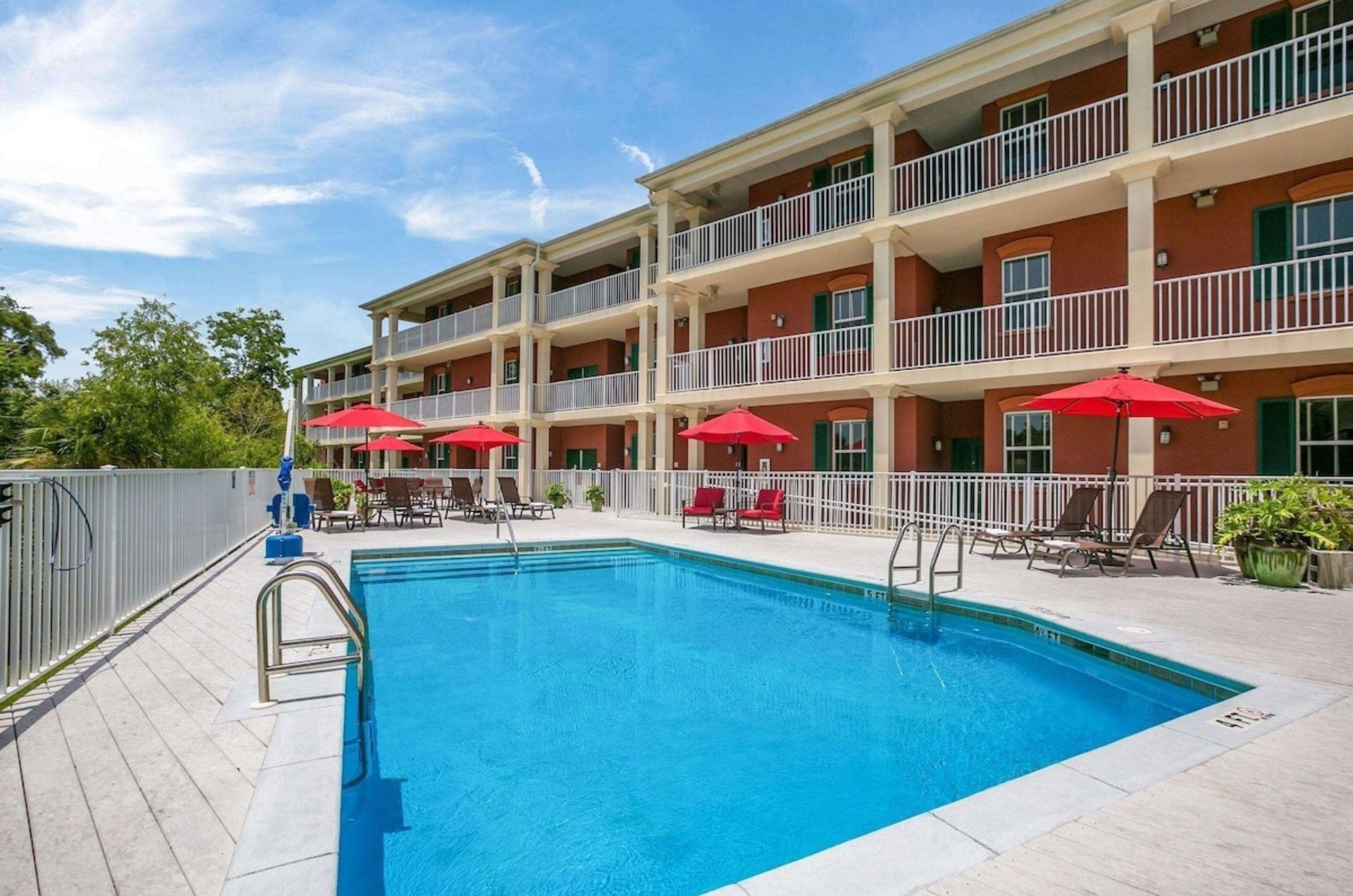 The sparkling outdoor pool in front of Water Street Hotel  Marina in Apalachicola Florida