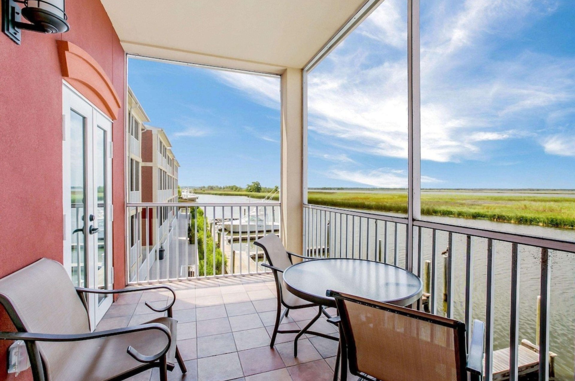 View of the bay from a private balcony from Water Street Hotel and Marina in Apalachicola Florida