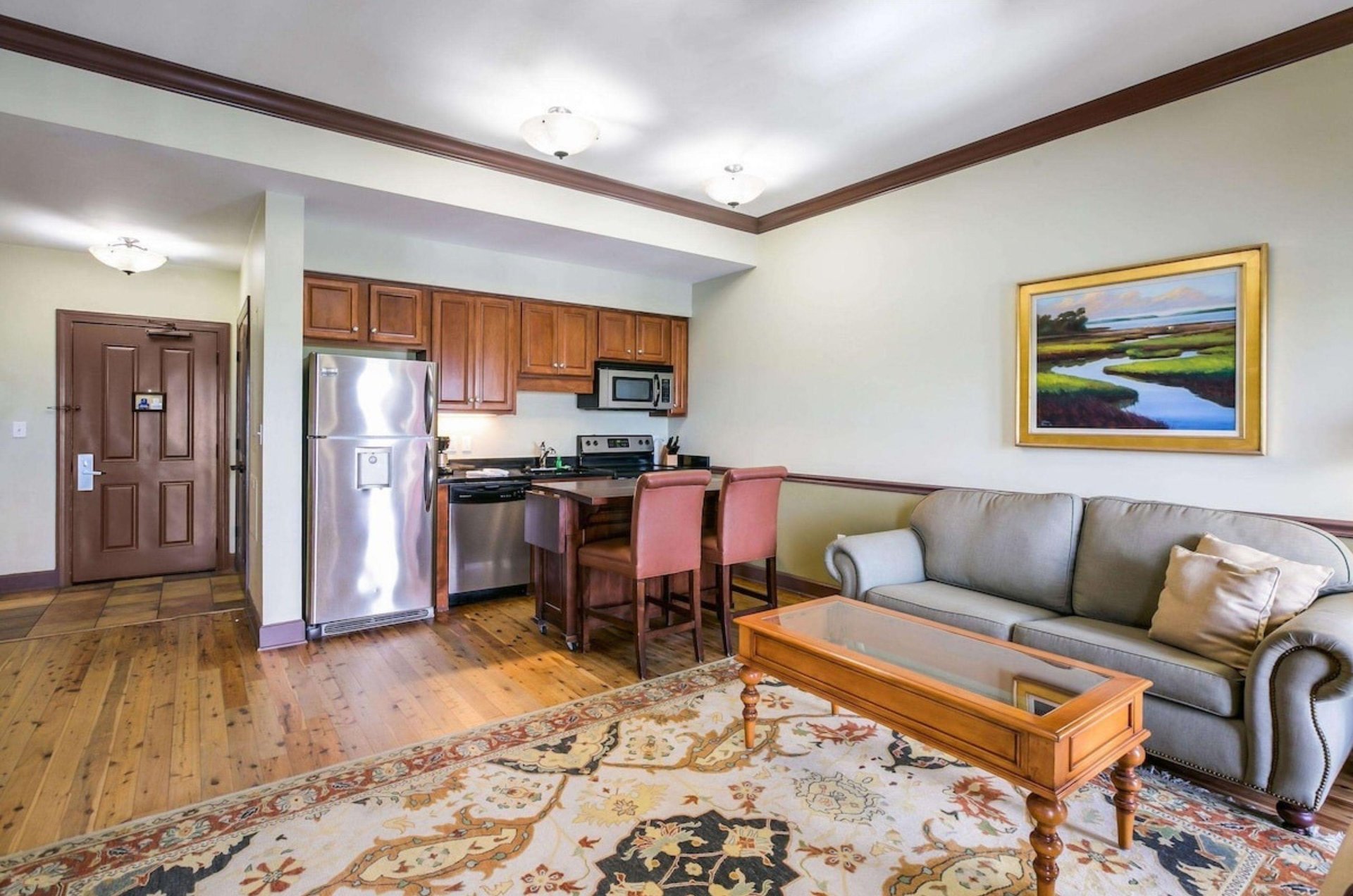 One of the beautiful living rooms in a suite at Water Street Hotel  Marina