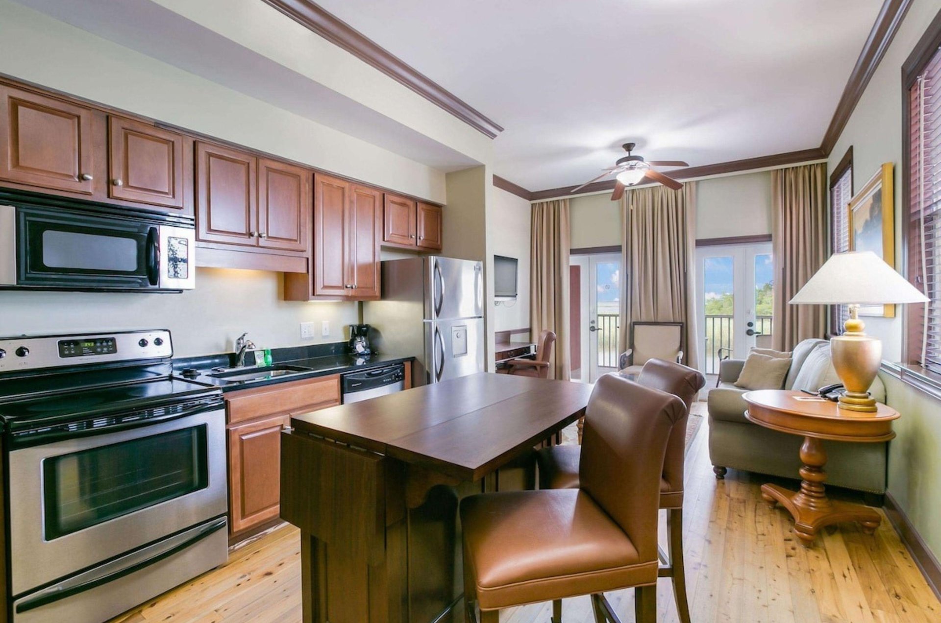 The fully furnished kitchen in a suite at Water Street Hotel  Marina