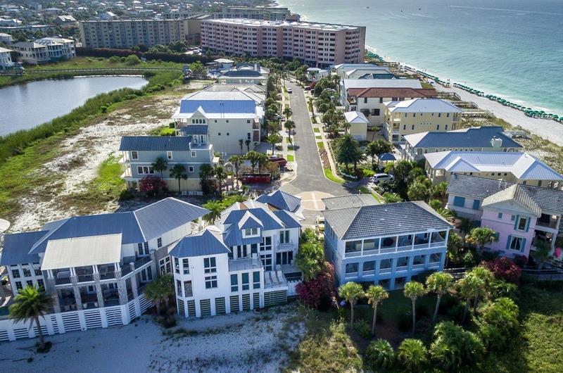 The community is adjacent to the snowwhite sands of the Gulf of Mexico.
