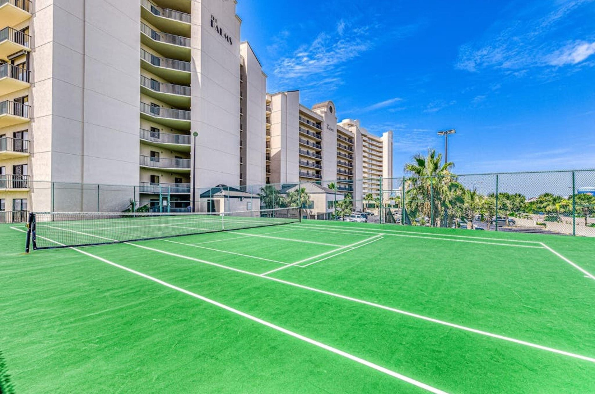 The outdoor tennis courts in front of the Palms in Orange Beach Alabama
