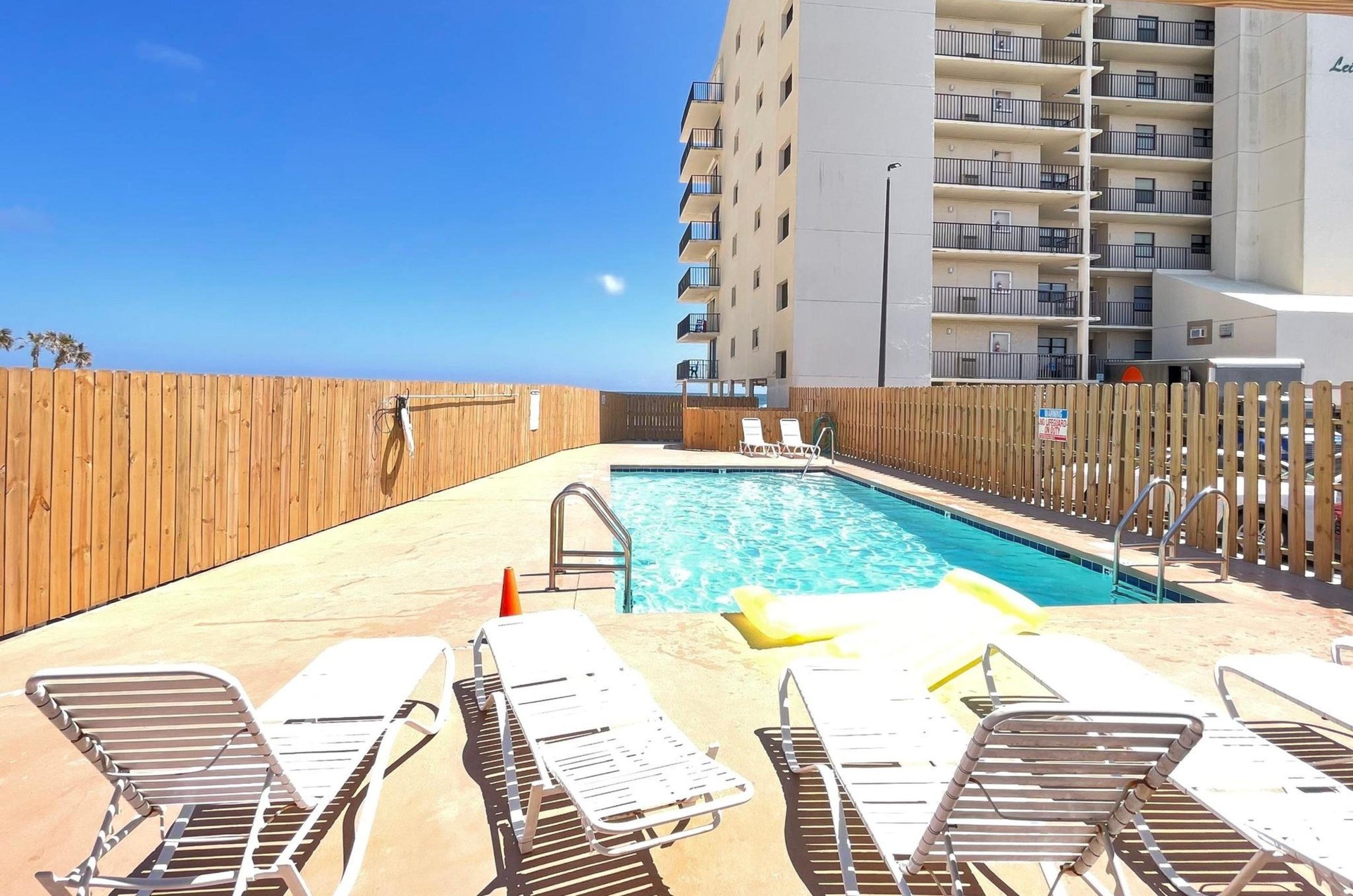 The outdoor swimming pool in front of Lei Lani in Orange Beach Alabama