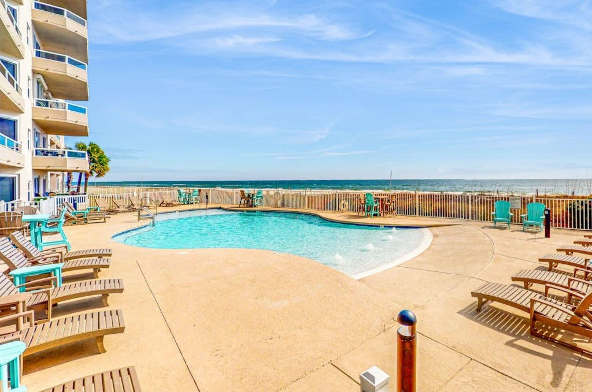 The outdoor swimming pool overlooking the beach at the Enclave in Orange Beach Alabama