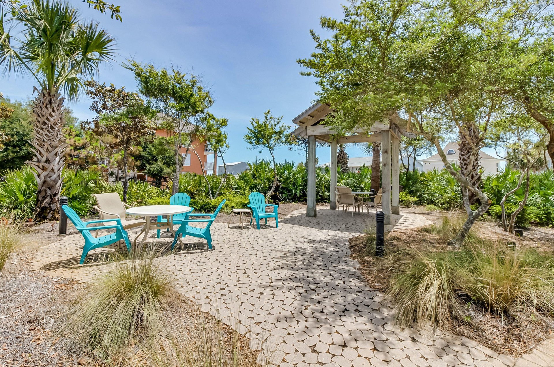 The property has tables and chairs both in the shade and the sun.