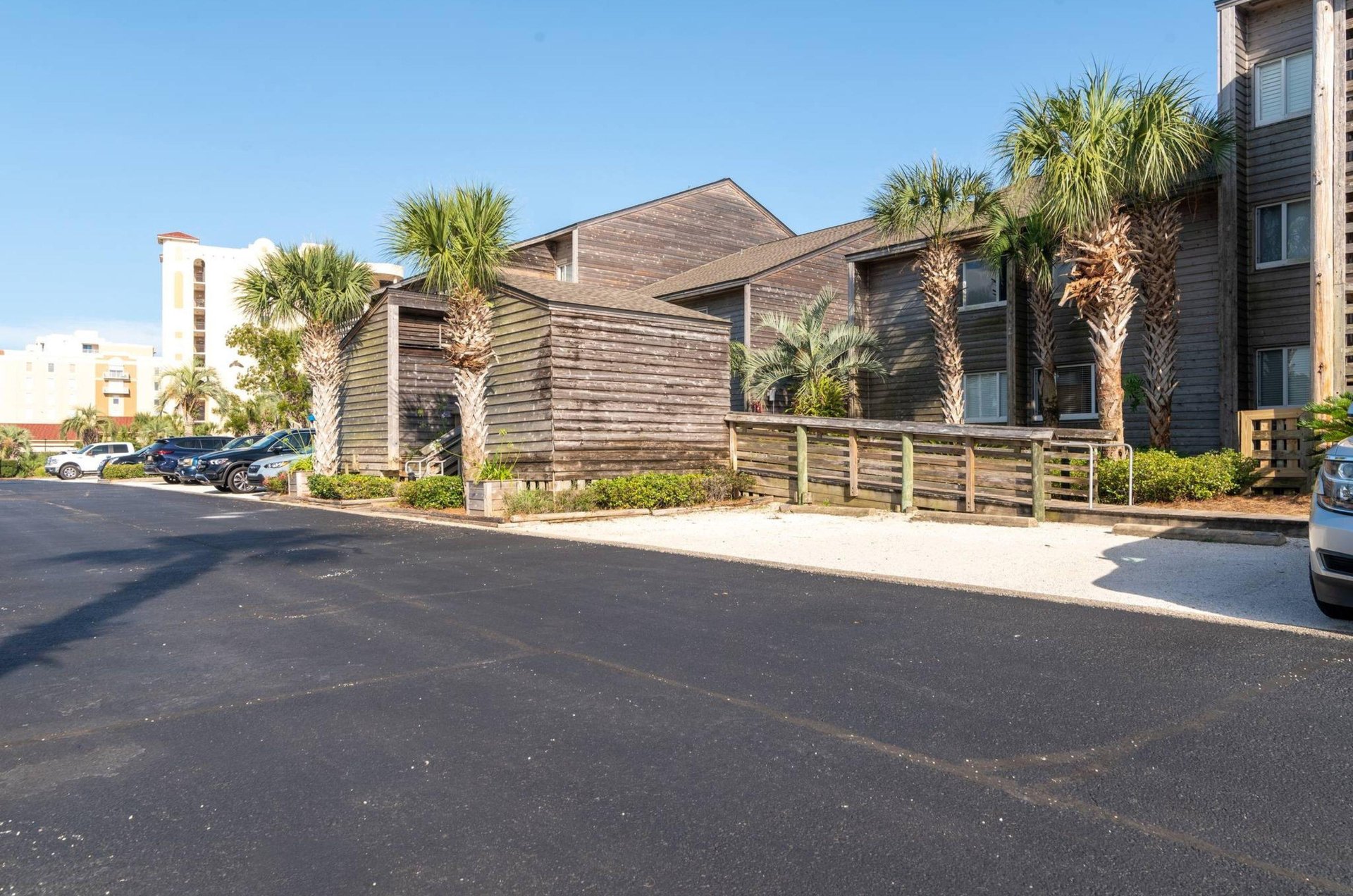 View from the street of a condominium at Needle Rush Point in Perdido Key Florida
