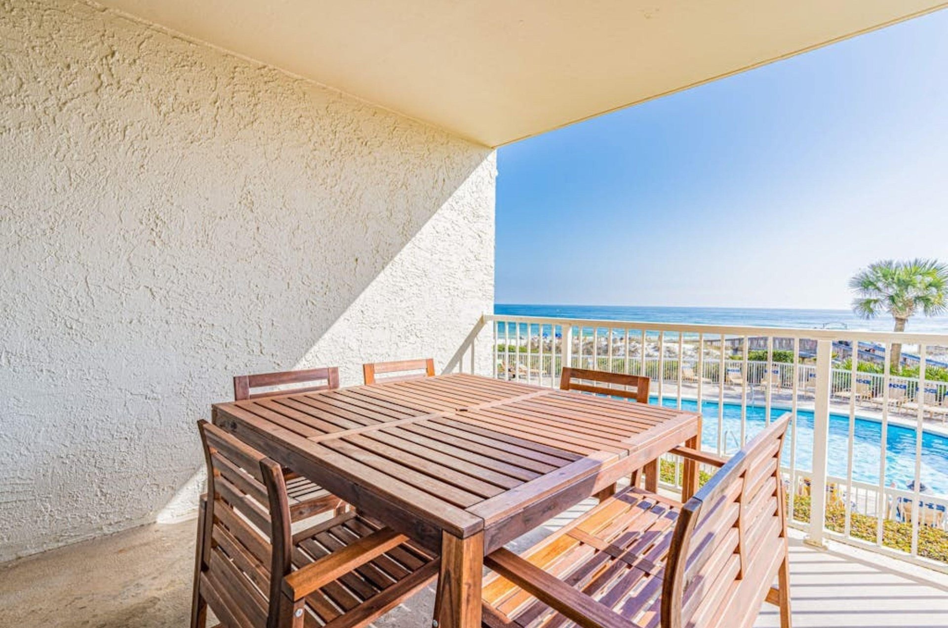 A dining table on private balcony at Seaside Beach and Racquet Club in Orange Beach Alabama