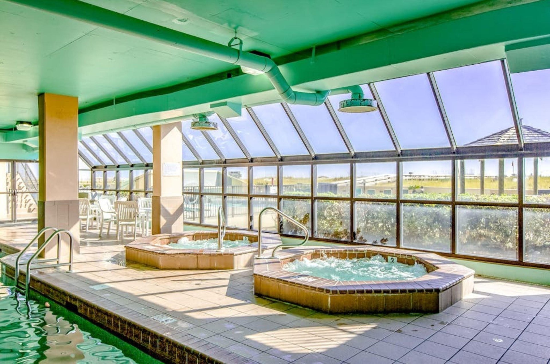 The indoor hot tubs next to windows at Phoenix VI