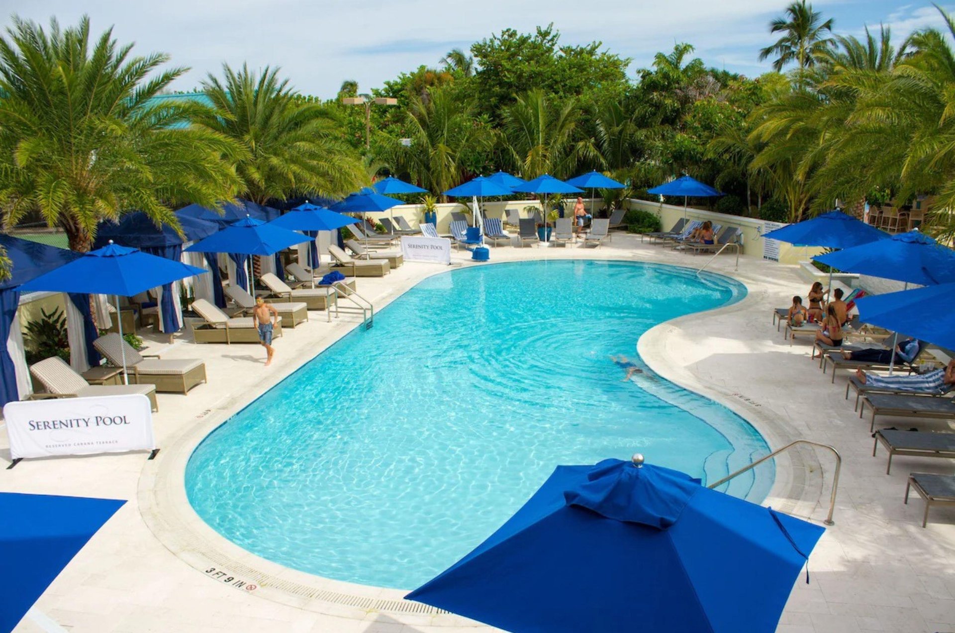 Enjoy one of two outdoor swimming pools and deck lounging areas