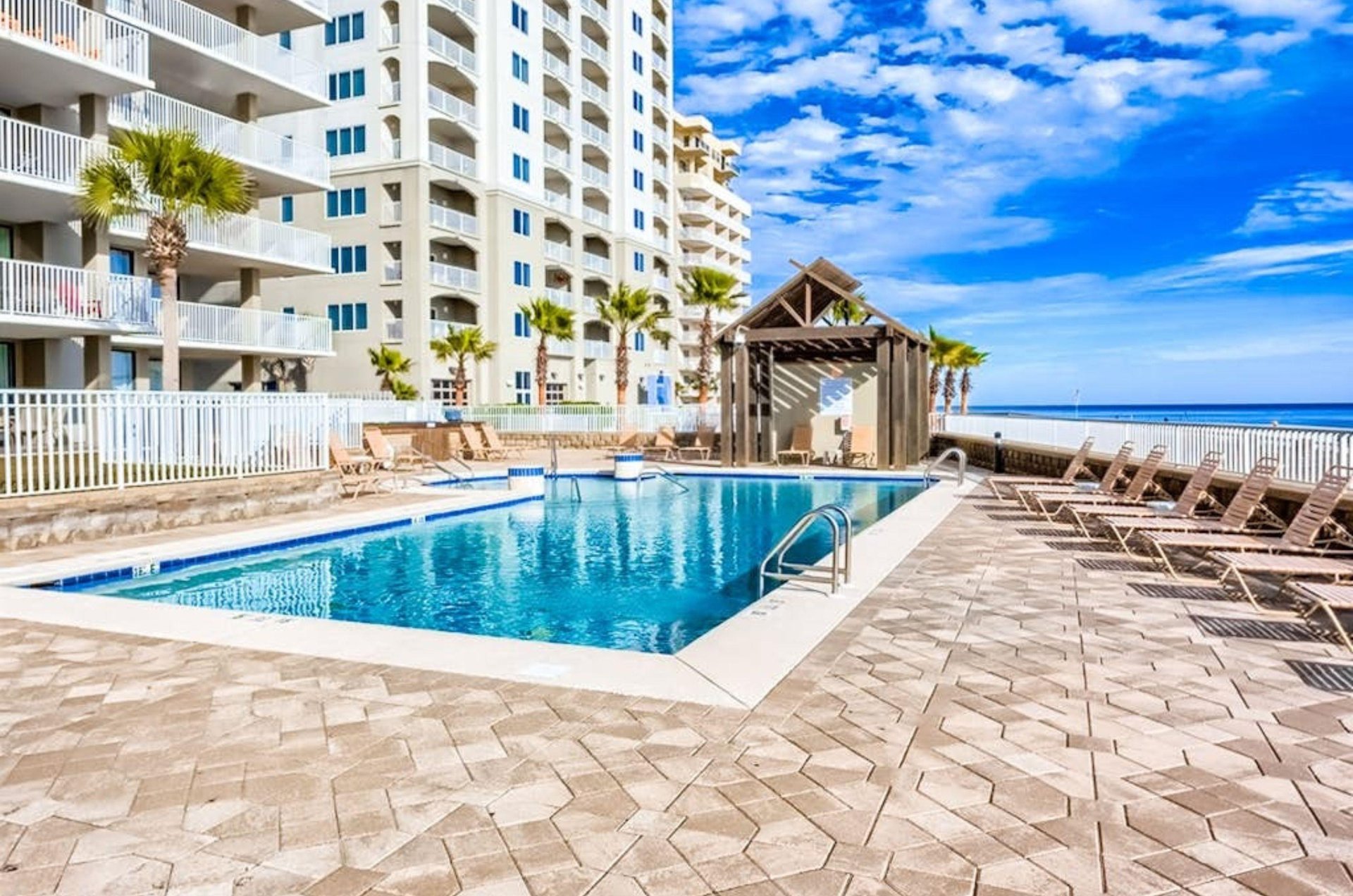 The outdoor pool in front of Romar Place in Orange Beach Alabama
