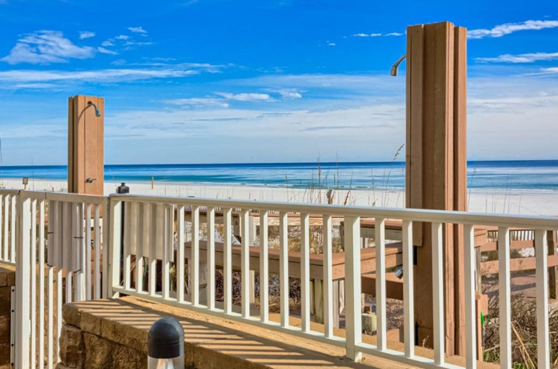 The outdoor showers on the boardwalk at Romar Place
