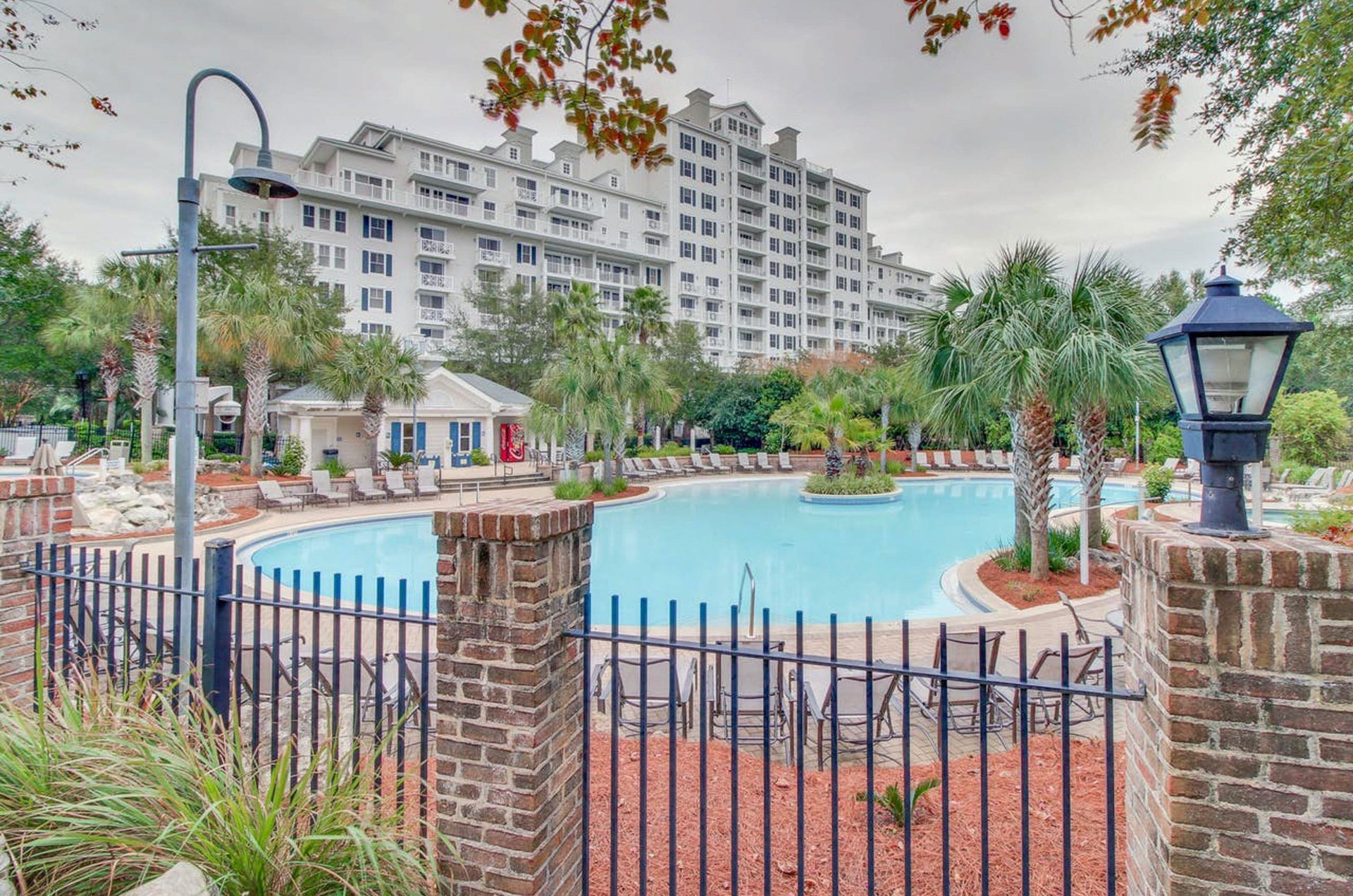The pool is gates with a cabana and soft drinks vending machine.