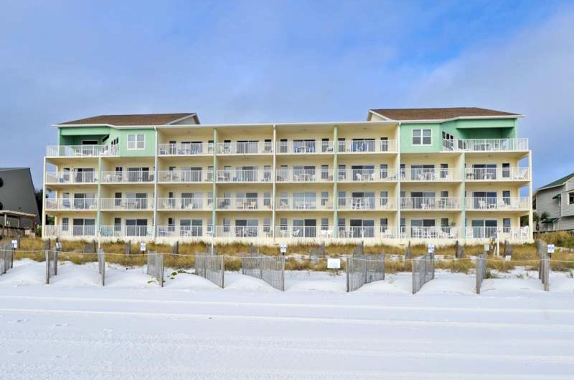 Cabana Club balconies overlook the sugarwhite beach.
