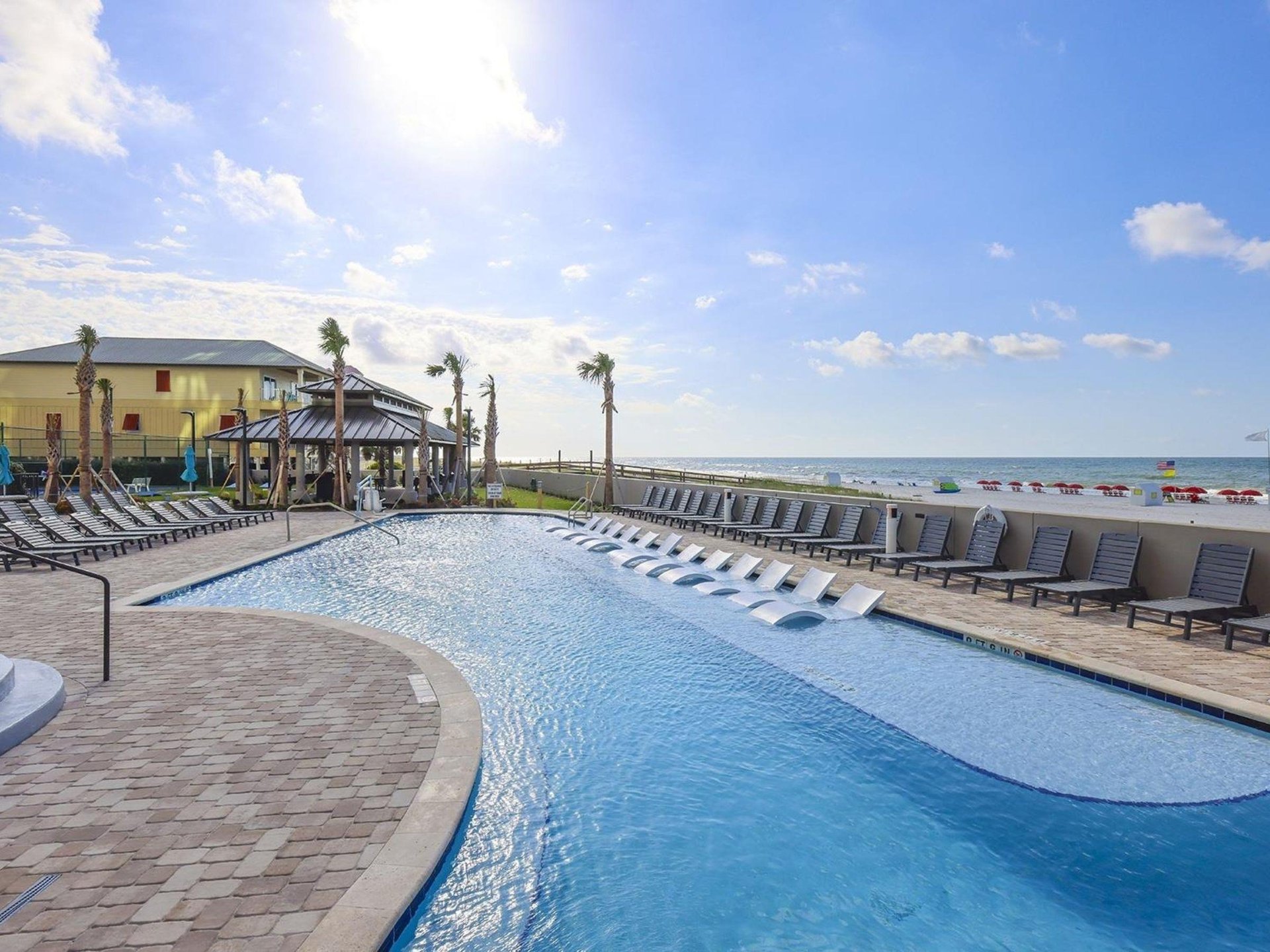 The beachfront swimming pool at The Oasis at Orange Beach
