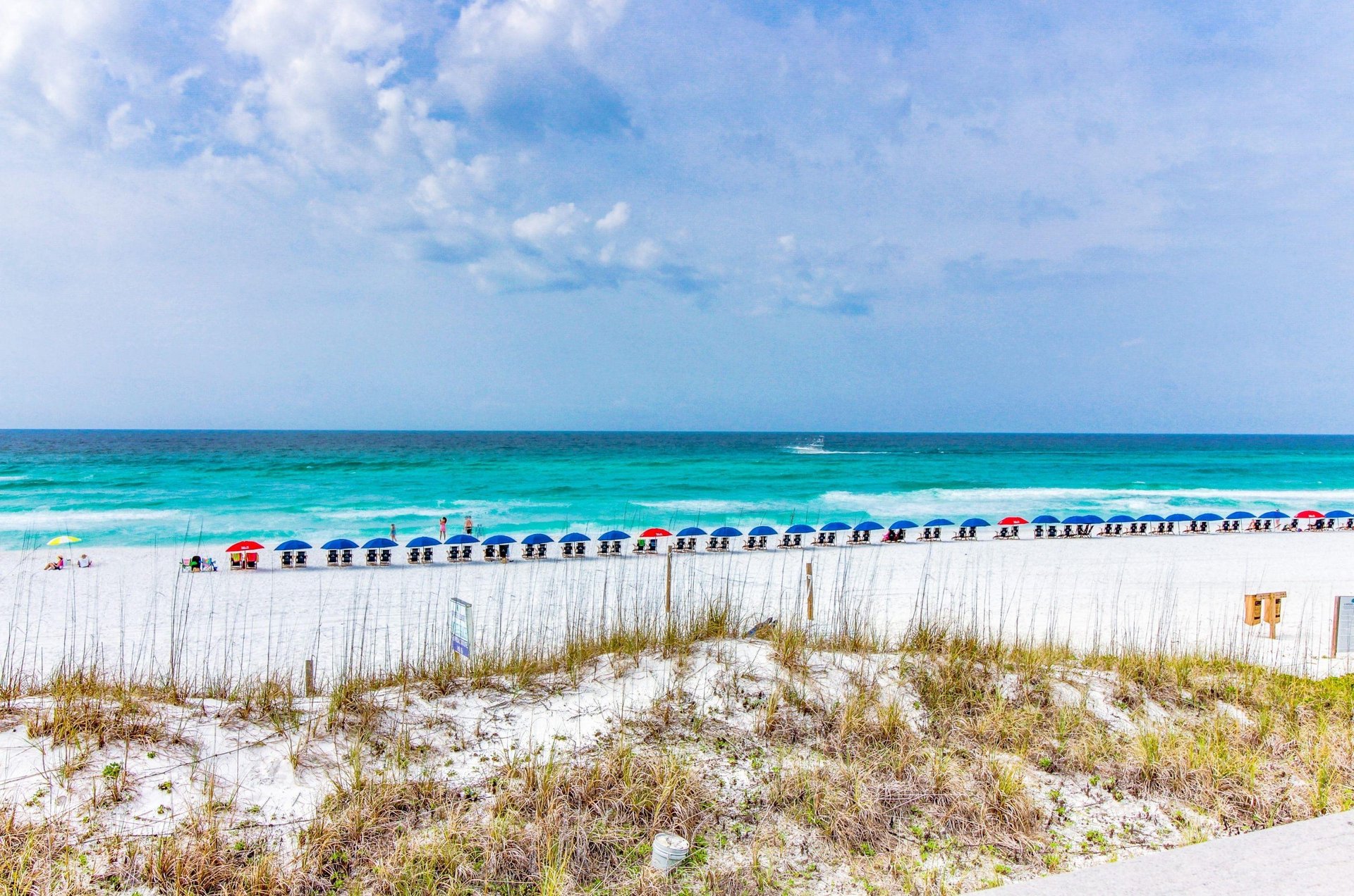 Miramar Beach Villas beach chairs and umbrellas