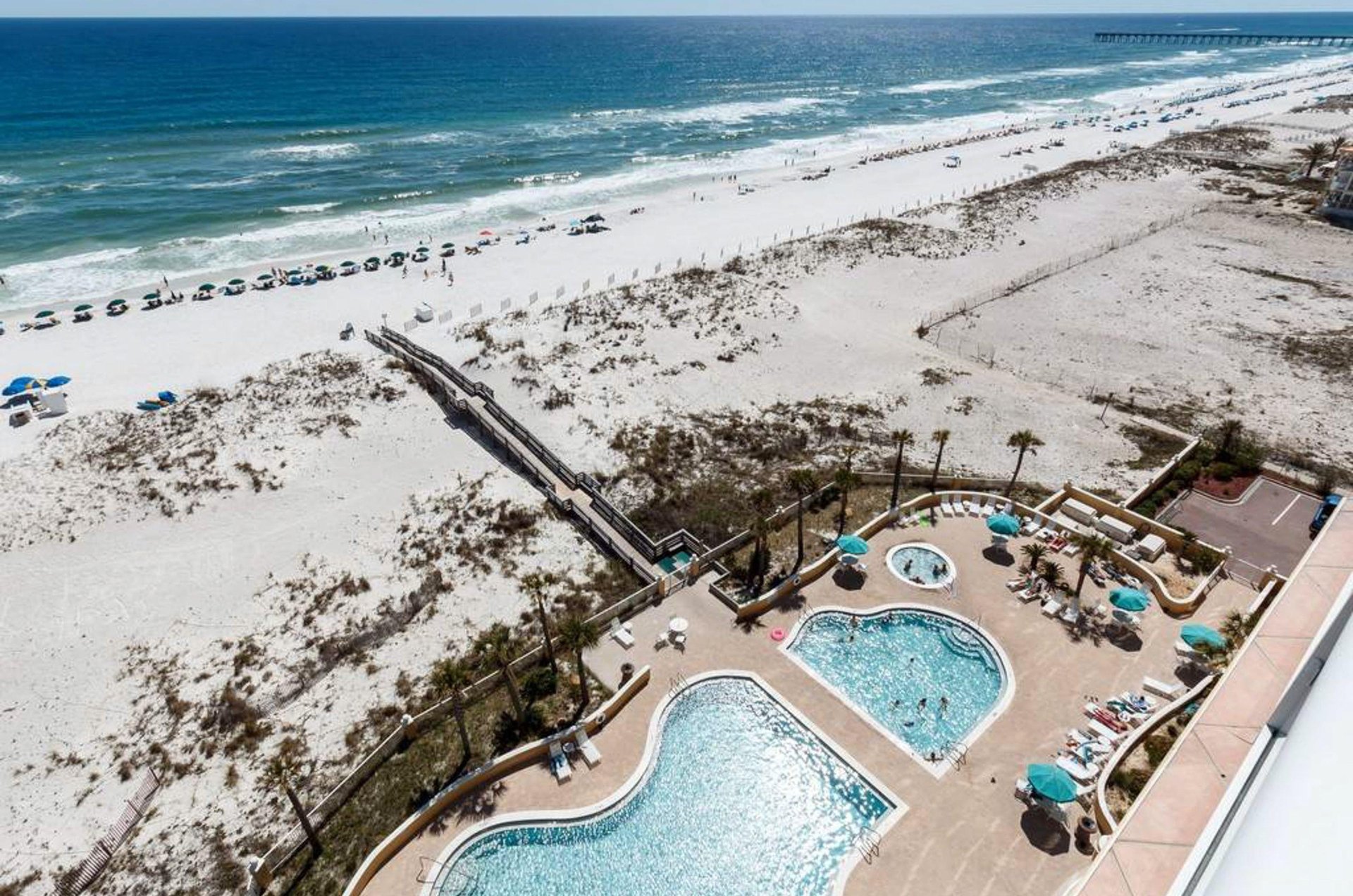 Relax at the beachside pool and courtyard