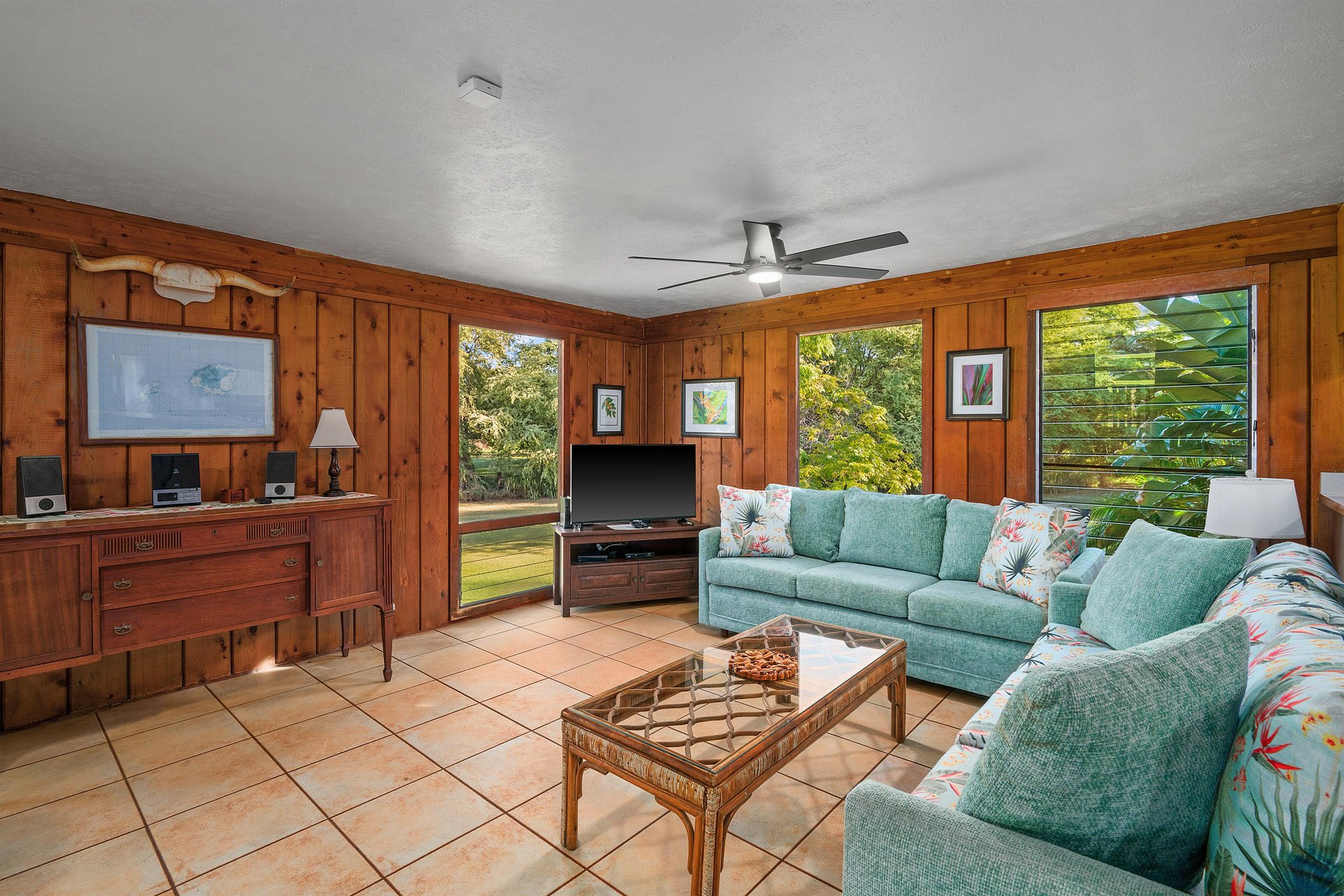 Relax in the living area equipped with a TV