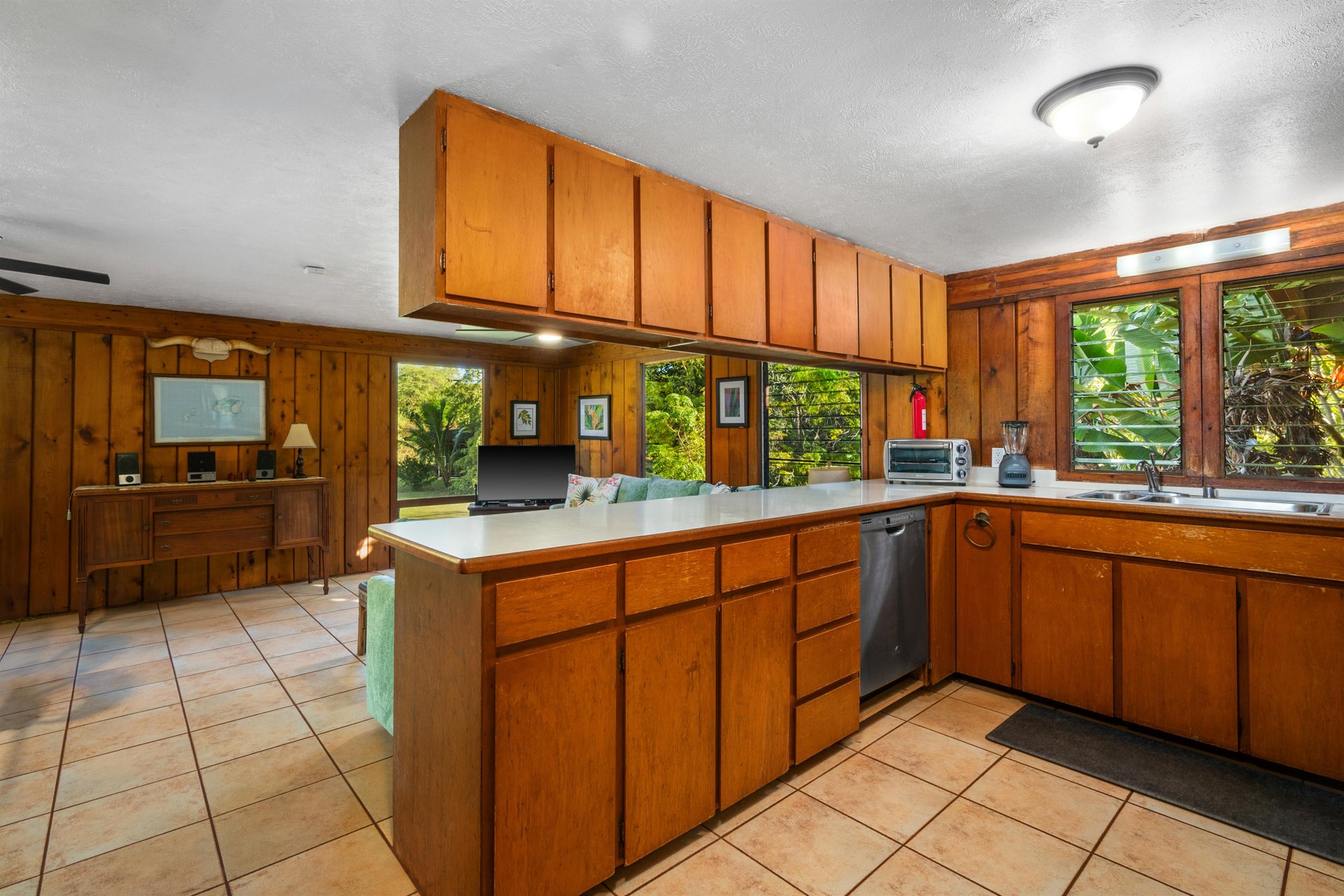 Kitchen is fully equipped with pots, pans and utensils