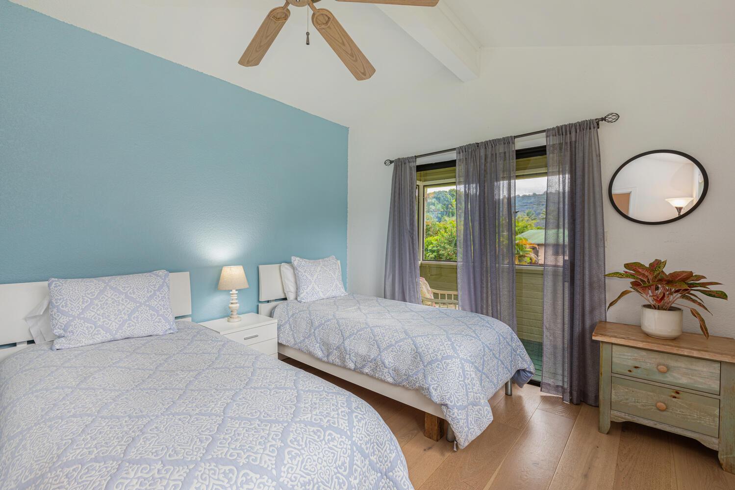 Bedroom 2 is equipped with two twin sized beds