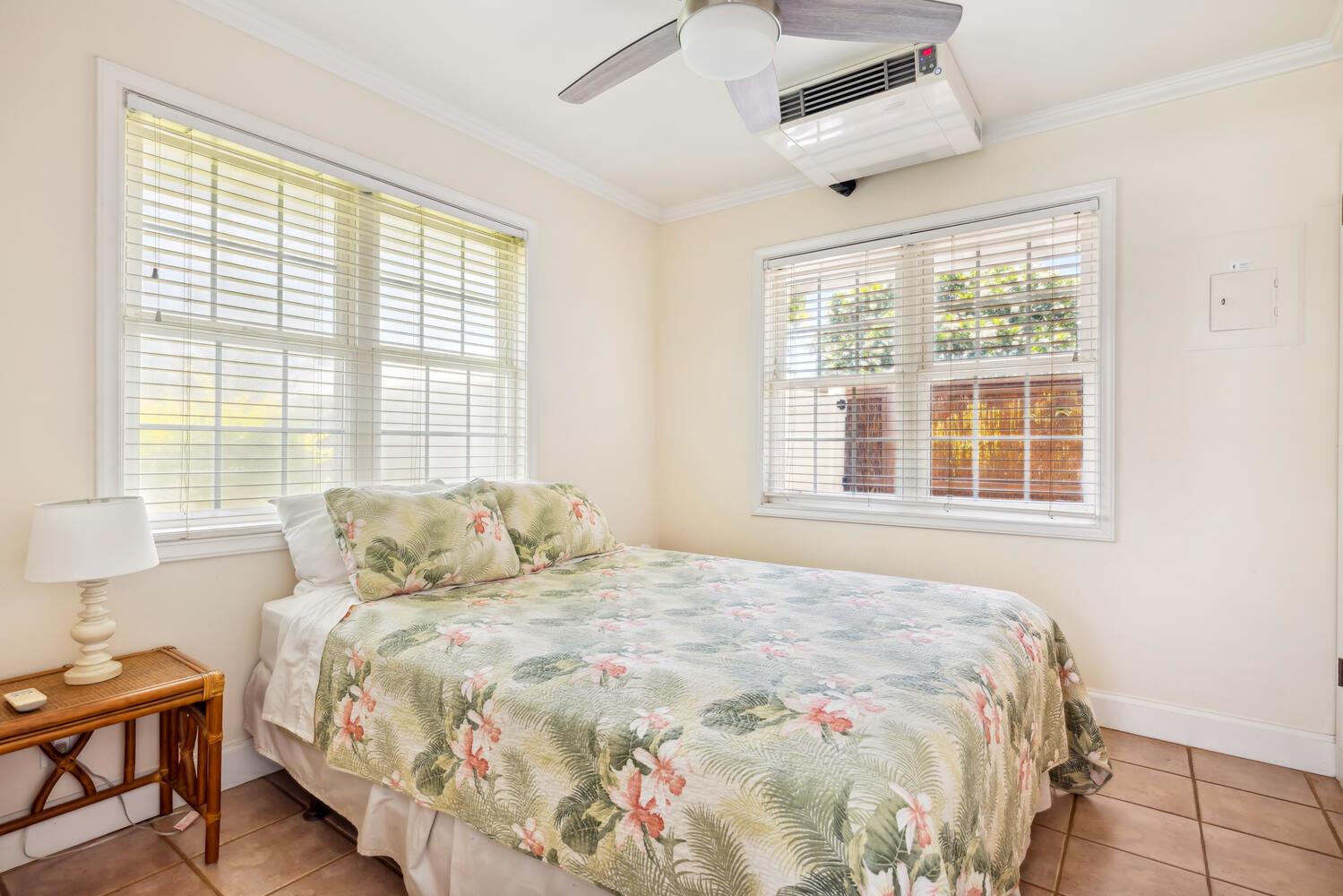 Downstairs master suite equipped with Queen bed