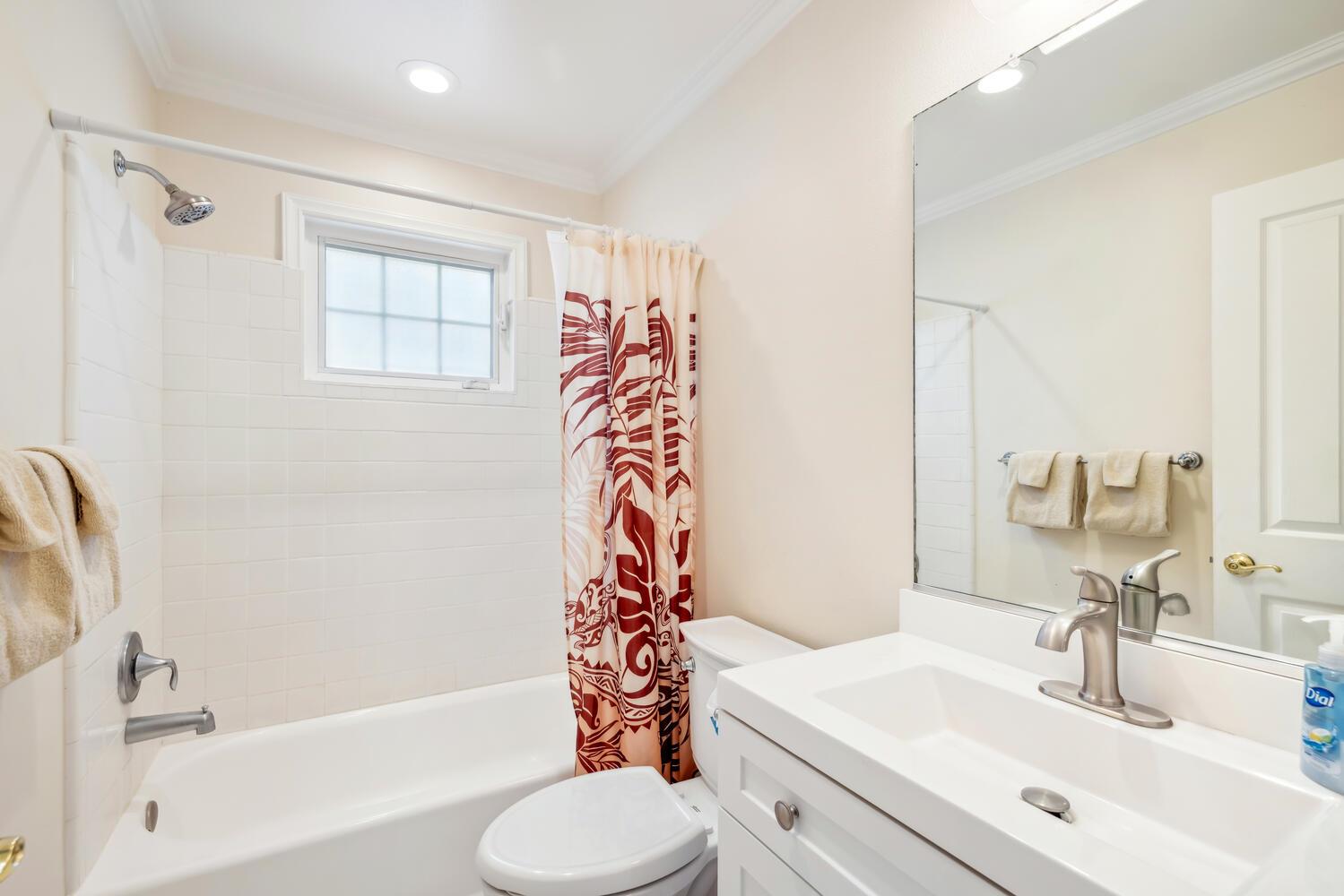 Third bathroom with showertub combo