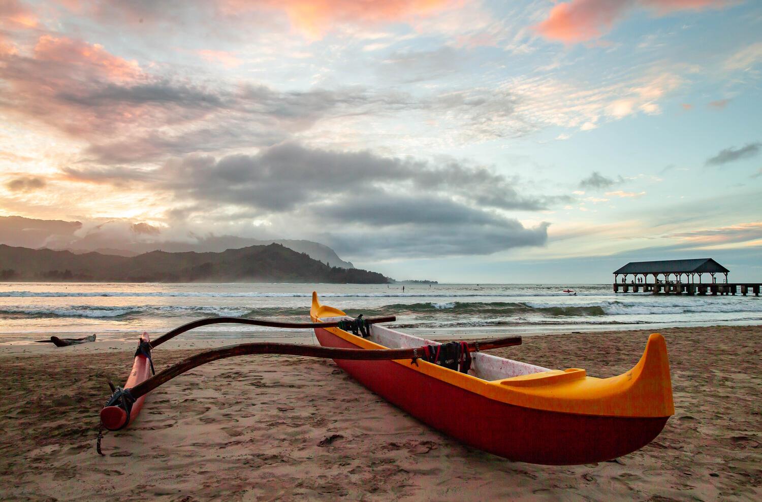 Canoe with view of Hanalei Pier