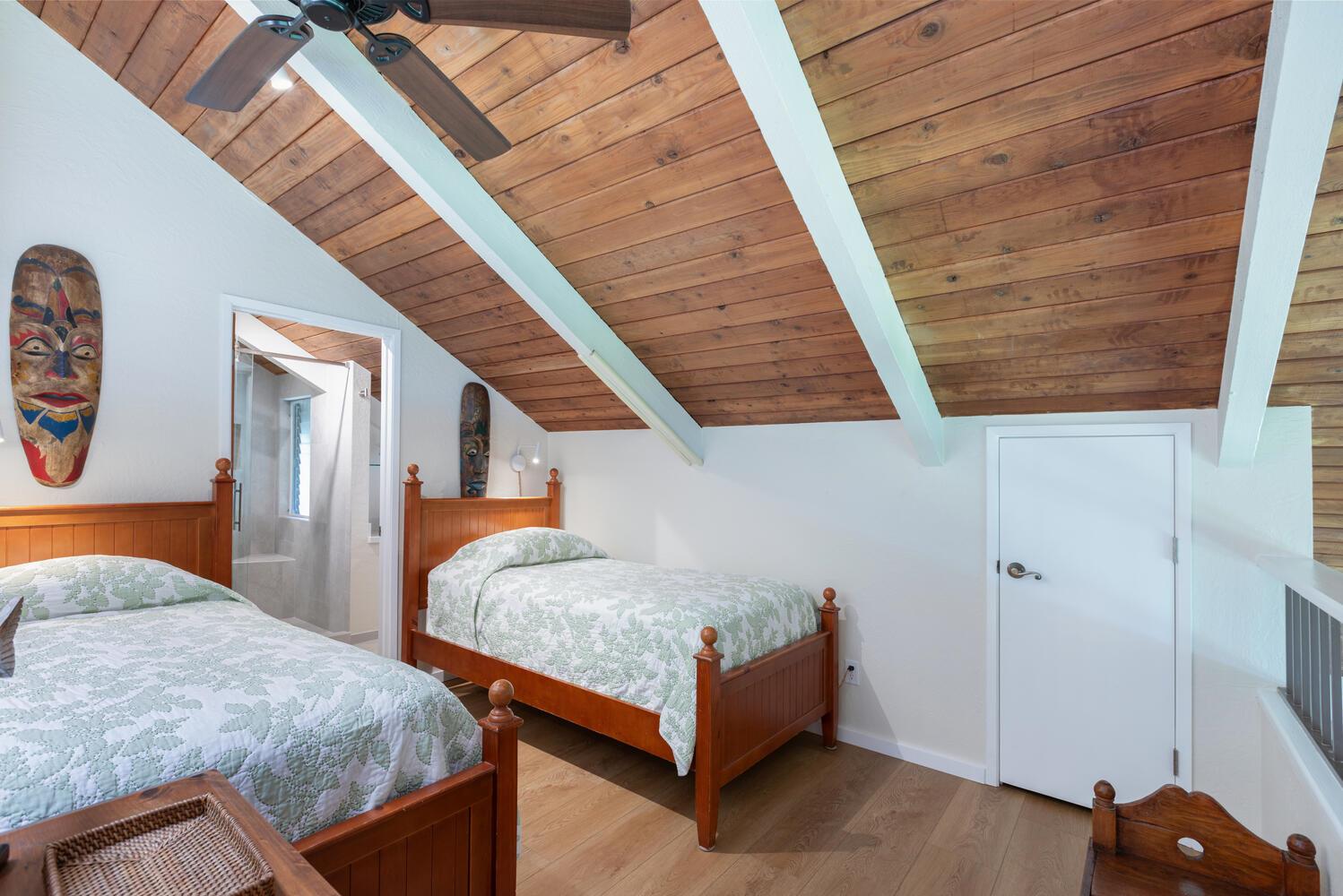 Upstairs loft equipped with two twin size beds