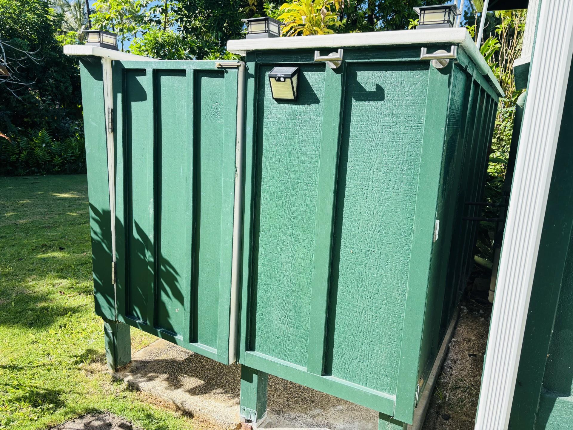 Outdoor shower is enclosed with locked door