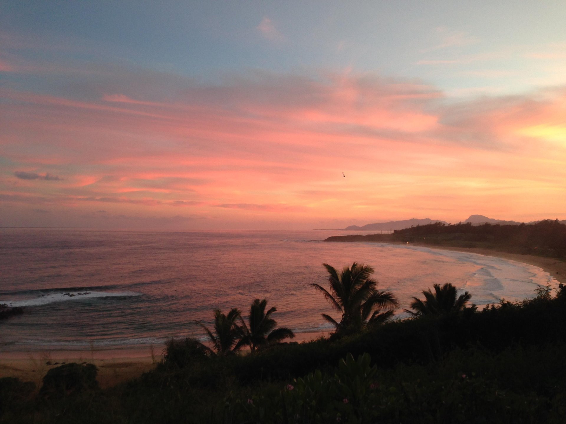 A beautiful sunset over Kealia Bay and Beach