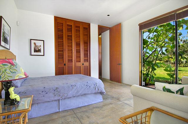 Guest bedroom  step into the tranquil back yard