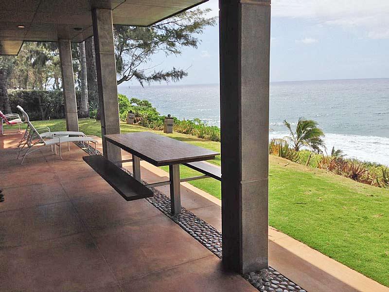 Granite  stainless steel picnic table above the ocean