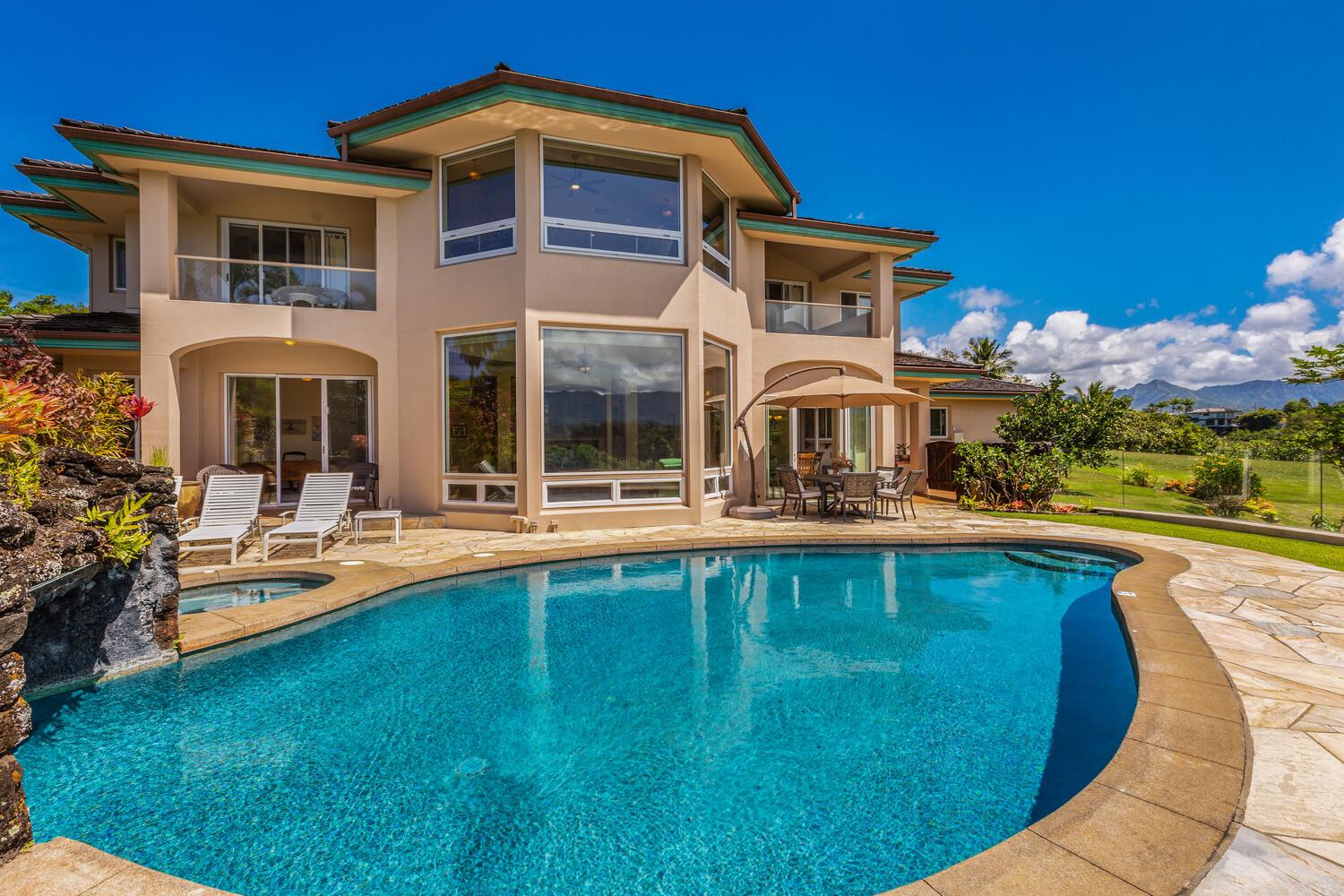 The pool is steps from the house