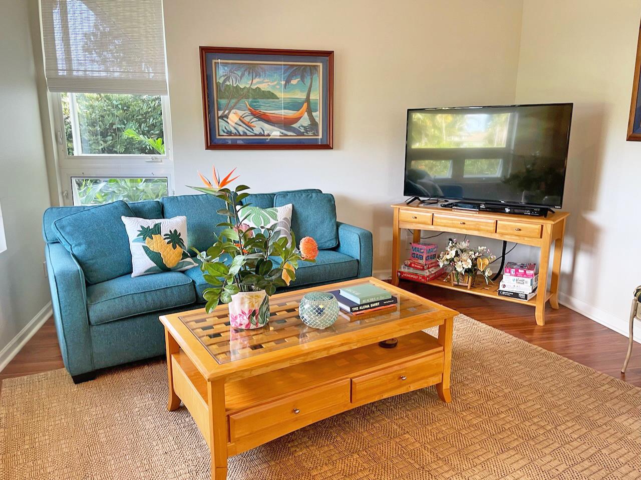 Wide screen TV with cable in living room and bedrooms