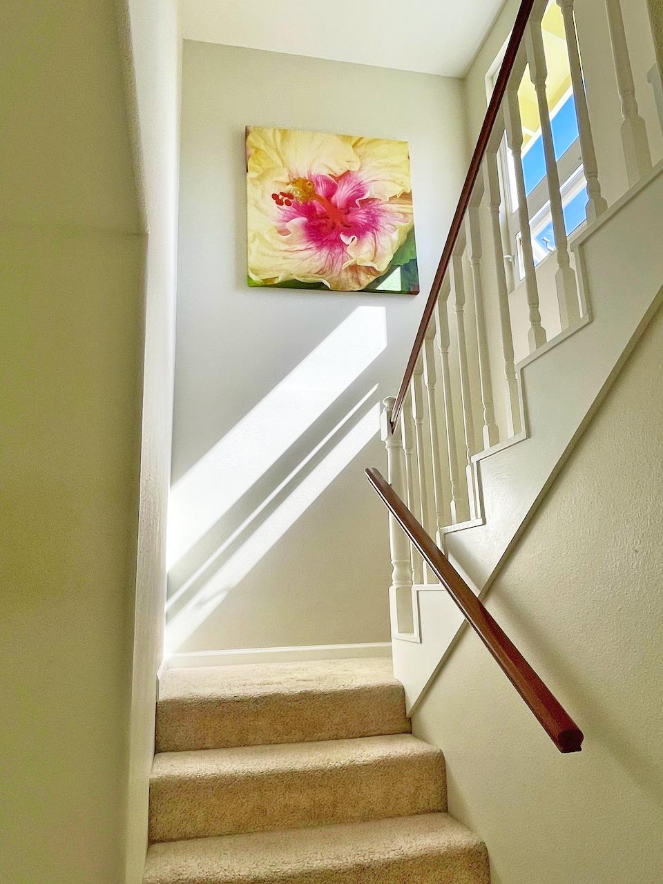 Stairs to second story and primary suite