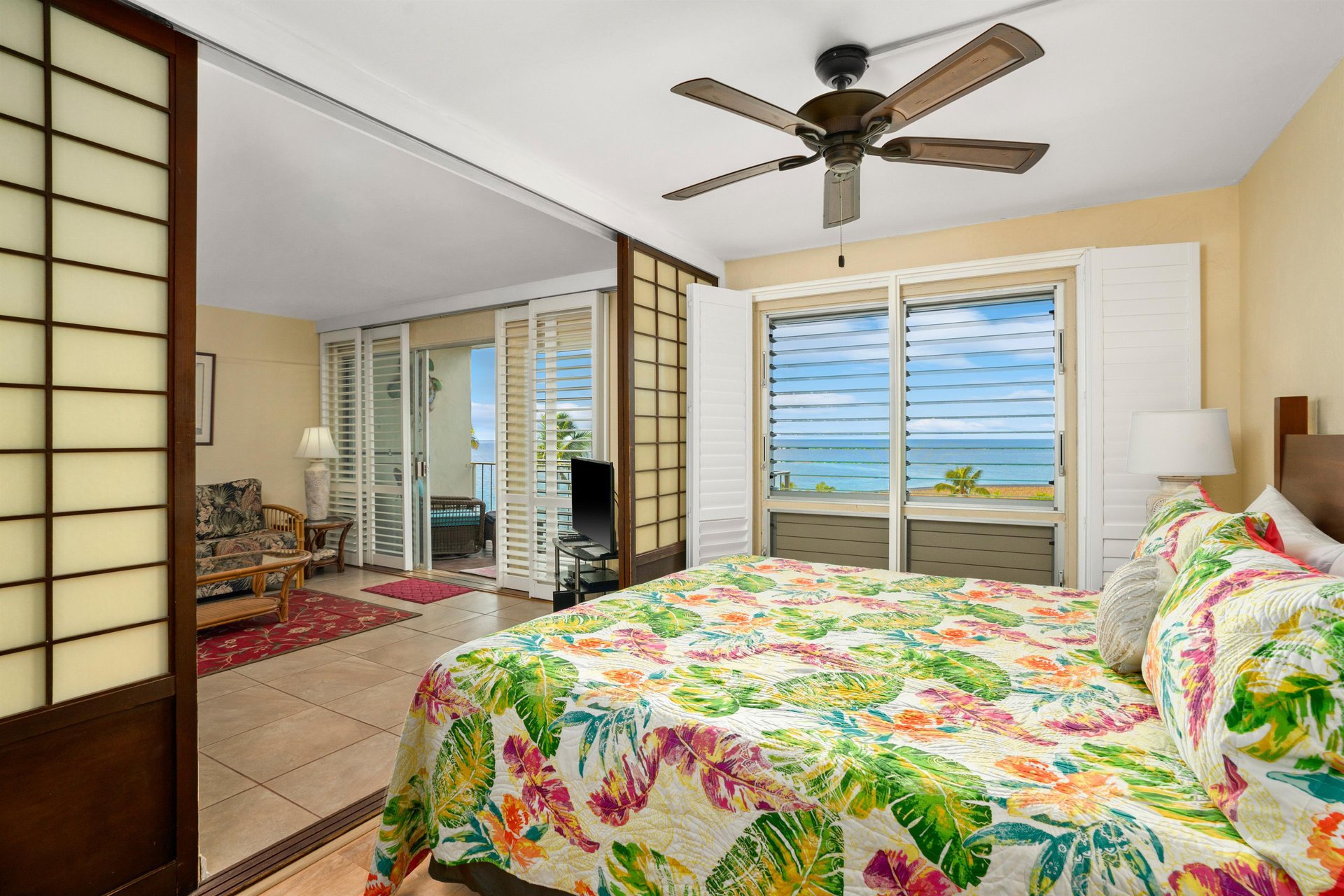 Bedroom has Shoji doors that open up to living area
