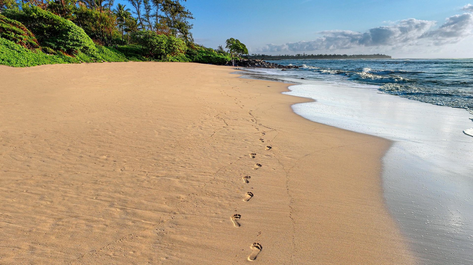 Enjoy walks on the white sandy beach